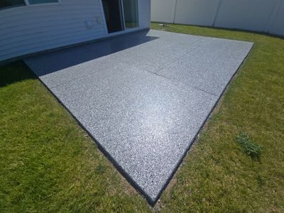 Concrete Patio Coating Installation with Smoke Flake Finish in Airway Heights