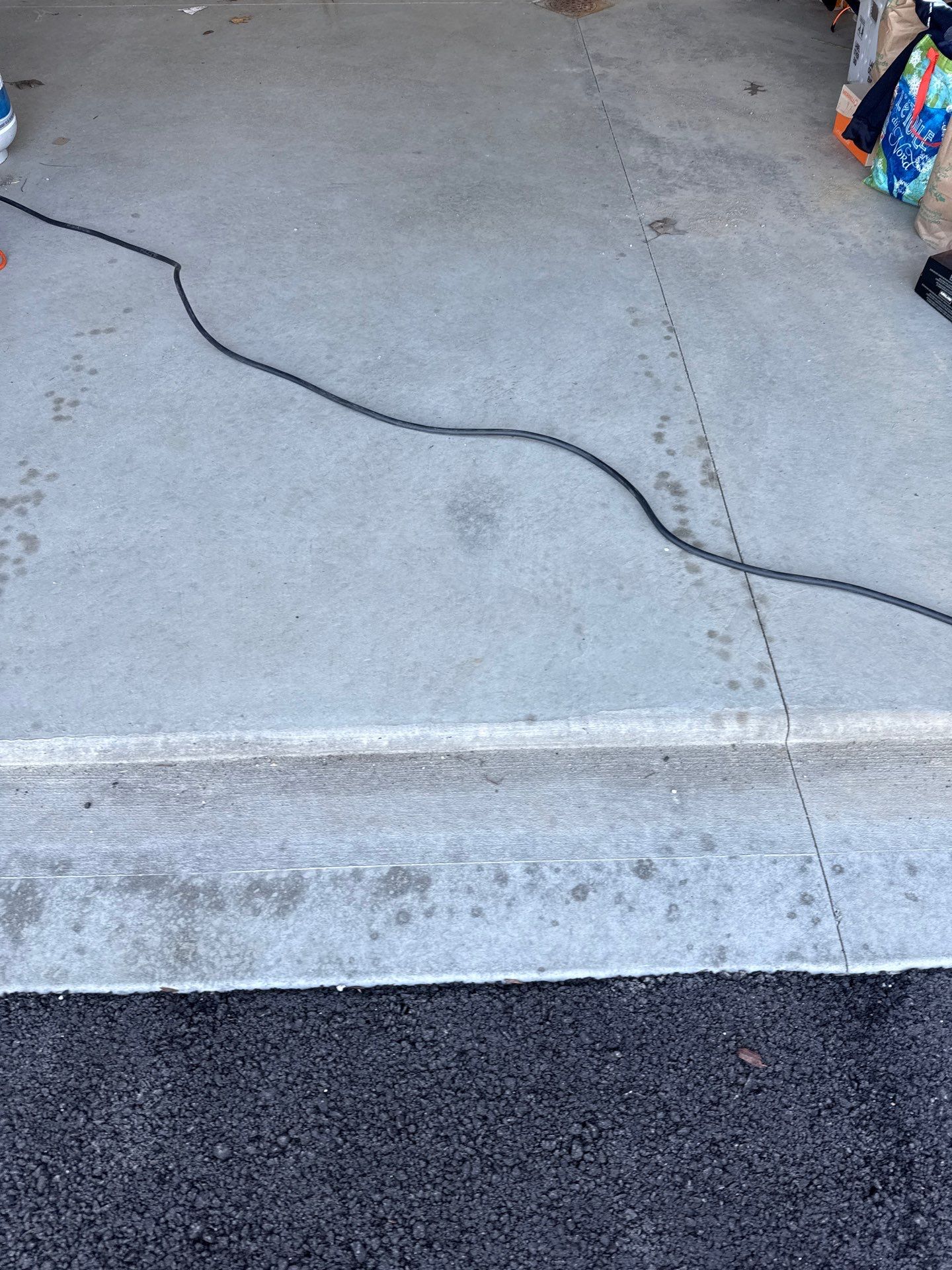 Porch + Garage Project in Evans City by Floors in a Day, Inc