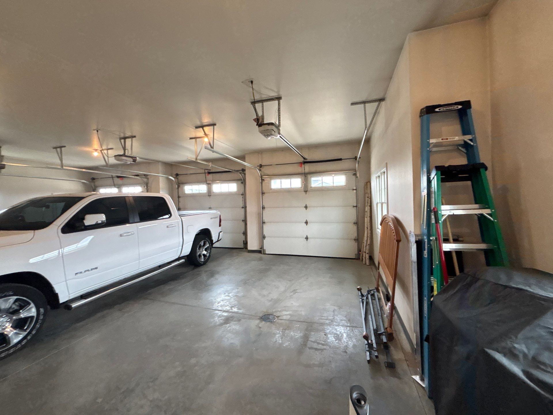 Multi-Car Garage Concrete Coating and Crack Repair in Dell Rapids by Select Painting, Coatings & Garage Cabinets