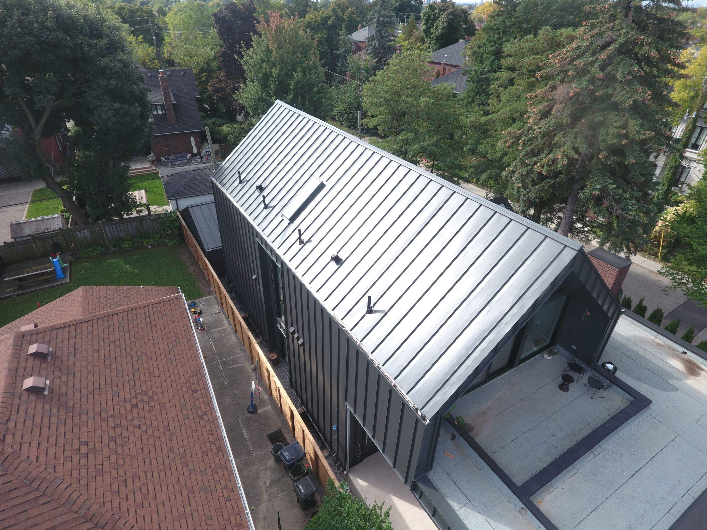 New Home Construction using 16" Standing Seam Panels by Jay Carter Roofing & Sheet Metal