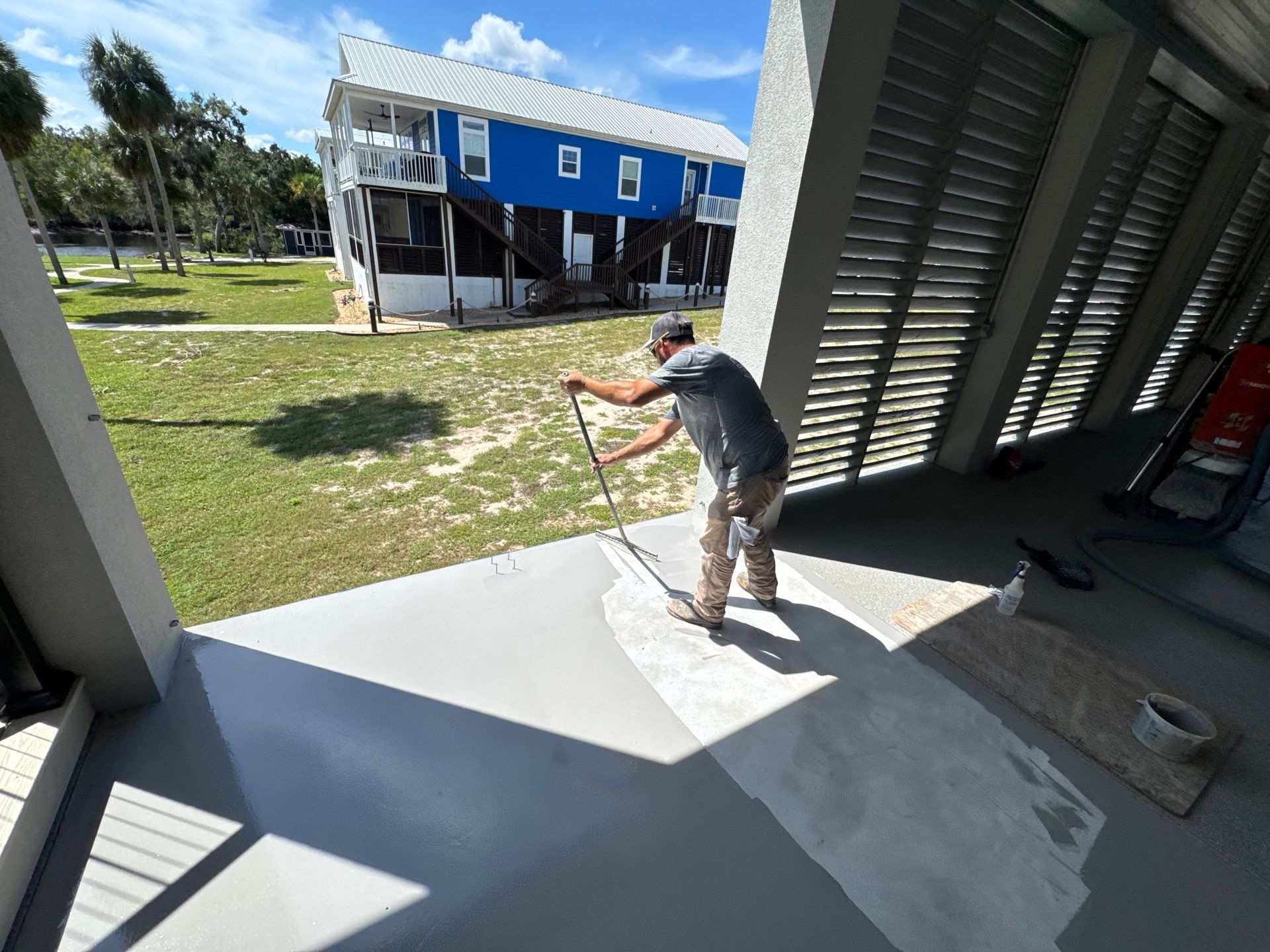 Under Side of Home in Hybrid Shale by Cross Creek Concrete Coatings