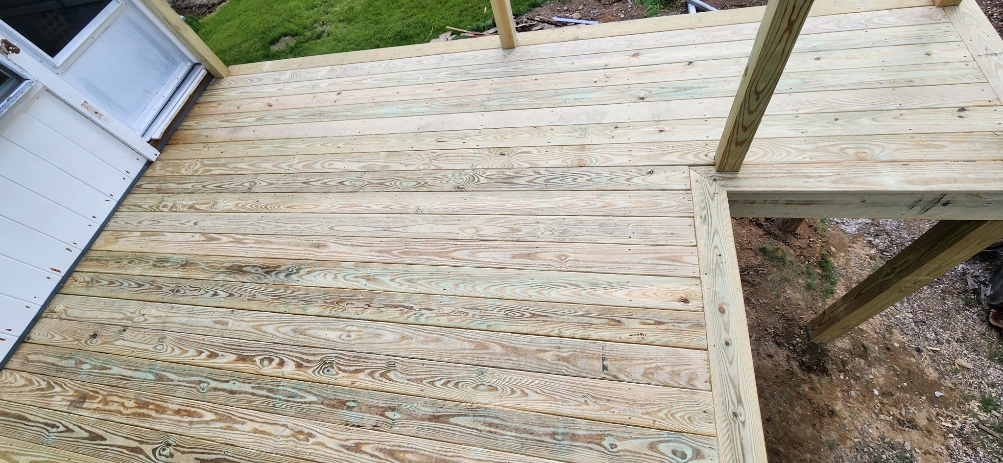 Moultonborough, NH – Pressure-Treated Deck Installation by Tall pine roofing