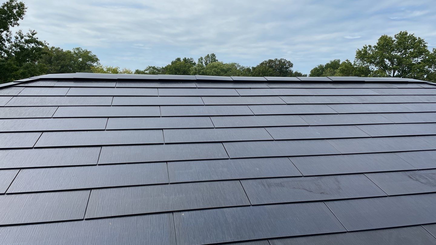 Tesla Solar Roof  using Tesla Solar Roof V3 tiles by American Home Contractors
