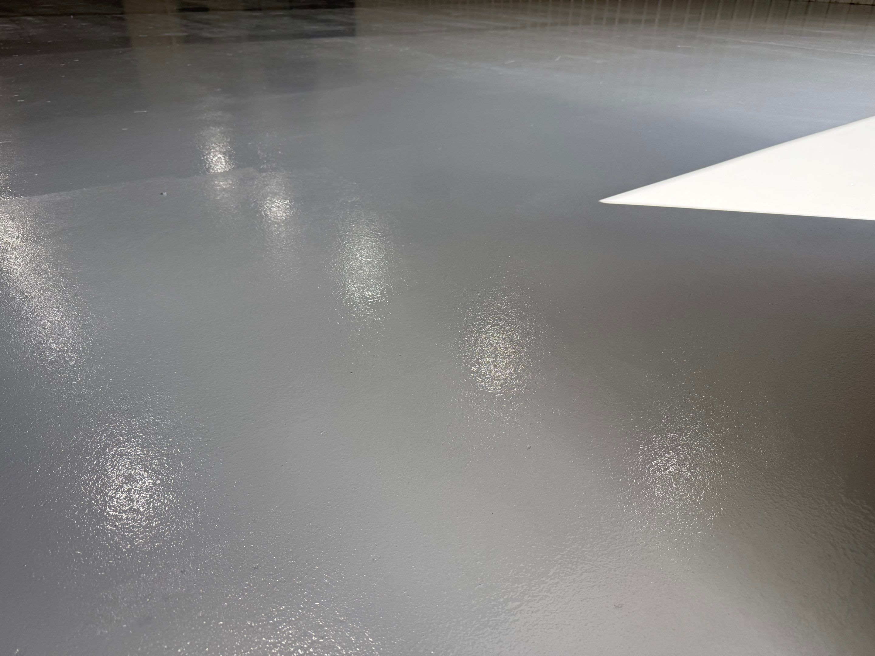 Commercial Concrete Coating and Floor Refinishing in Sioux Falls by Select Painting, Coatings & Garage Cabinets