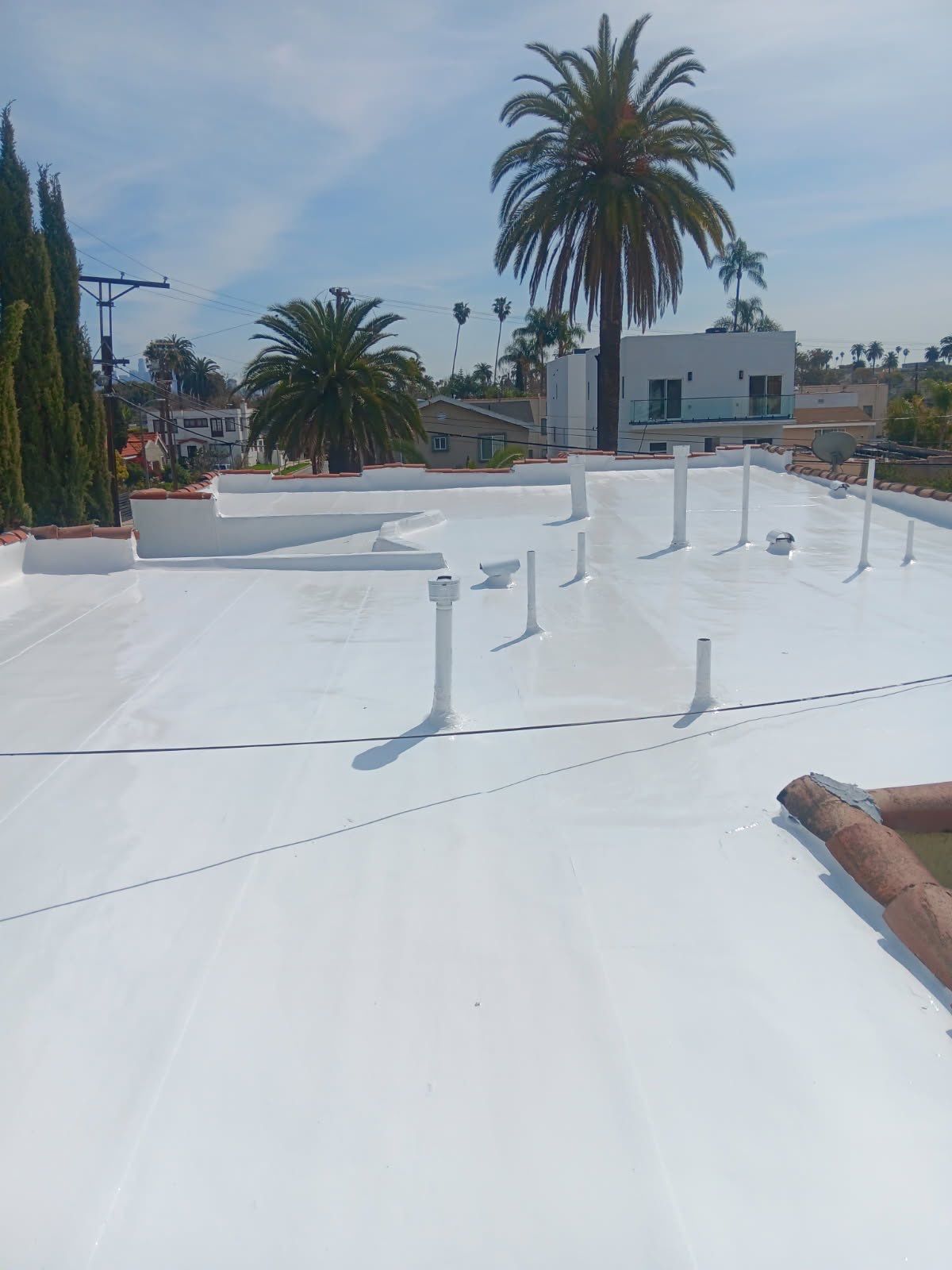 Silicone Membrane Installation using American Standard Coatings Silicone-S by Hull Brothers Roofing