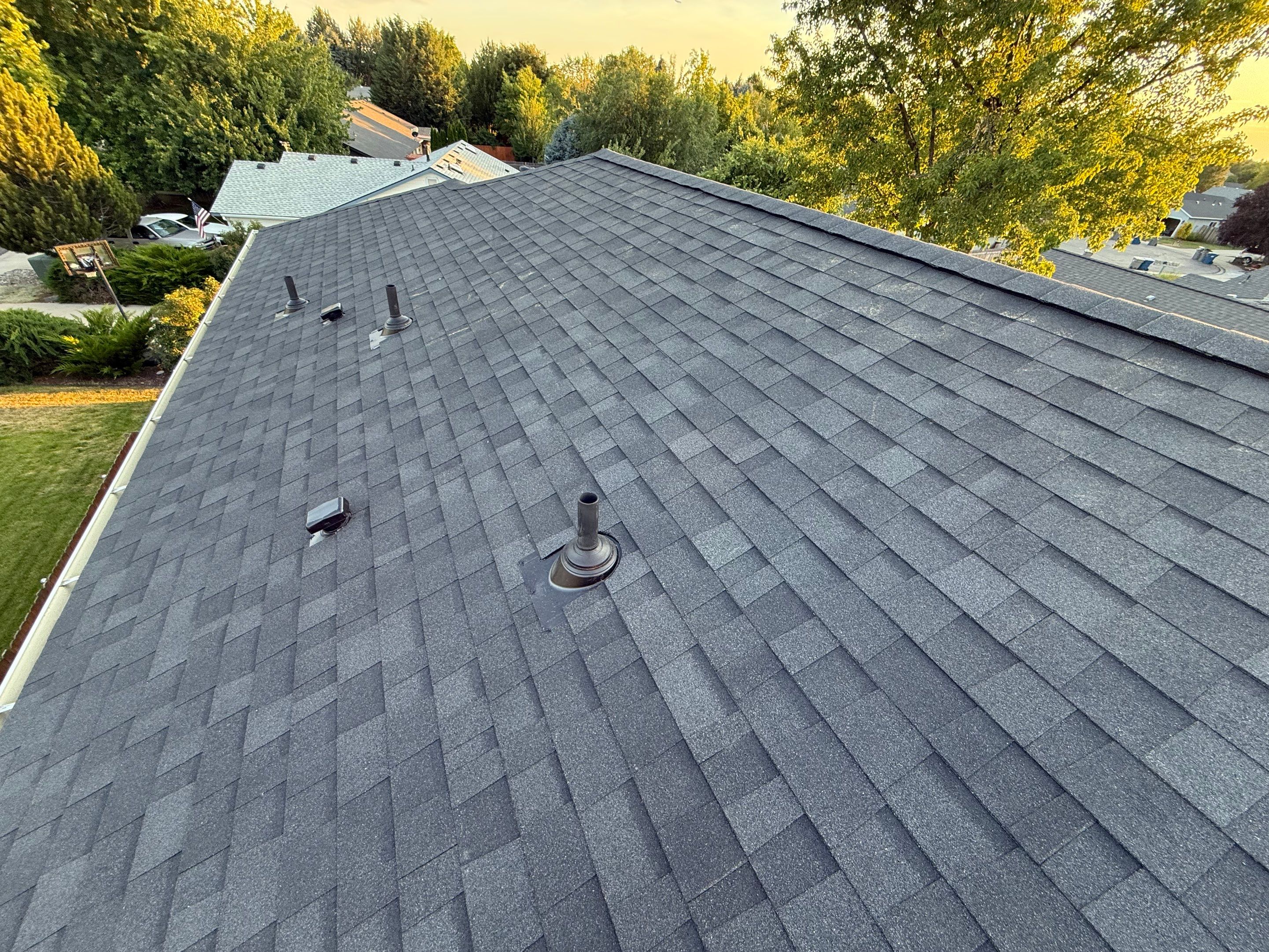 Residential Roof Replacement and Seamless Gutter Installation in Boise by Olive Roofing