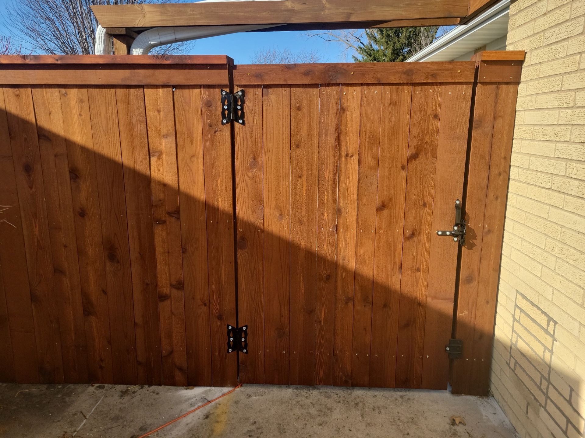 Custom Cedar Wood Privacy Fence with Double Gates and Integrated Planter Mailbox by Perfect Picket Fence and Stain
