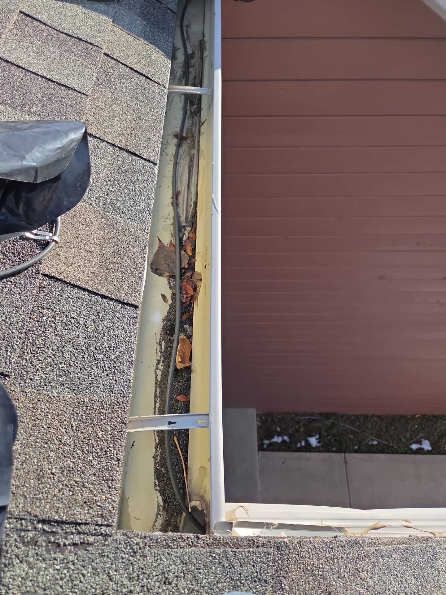   Clean Gutters and Downspouts by RTP Roofing Company