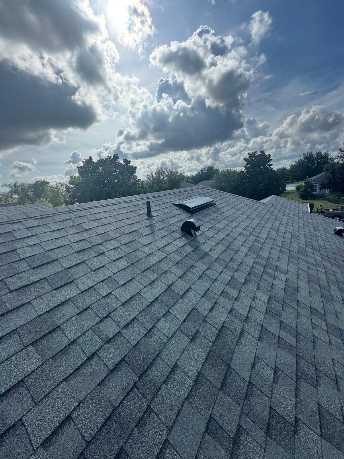 Residential Roof Installation With Estate Grey Architectural Shingles in Bradenton by Trinity Restoration and Roofing LLC