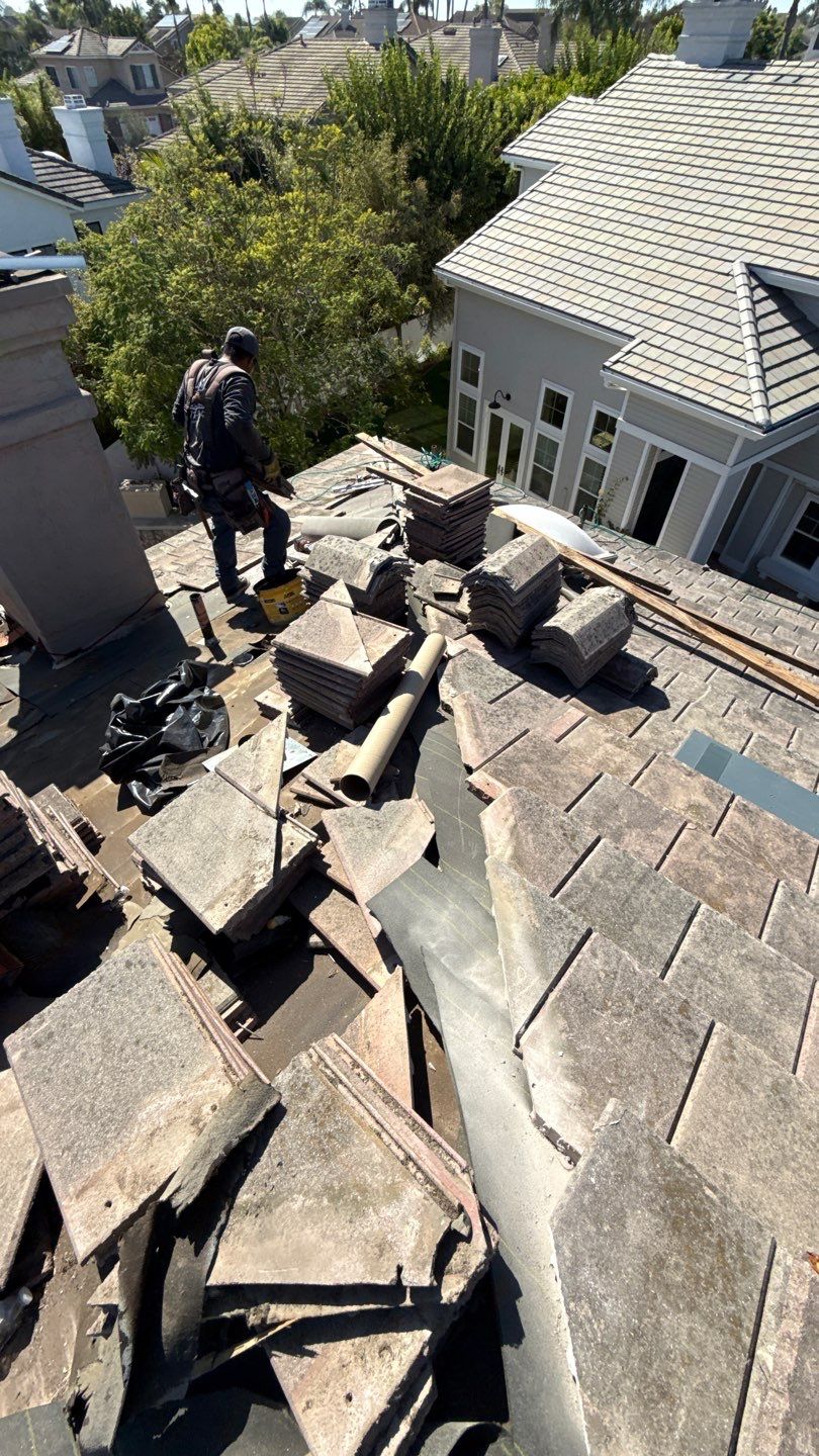 Carlsbad Concrete Tile Roof Replacement with Copper Flashing and Skylights by Reliable Roofing San Diego Inc.