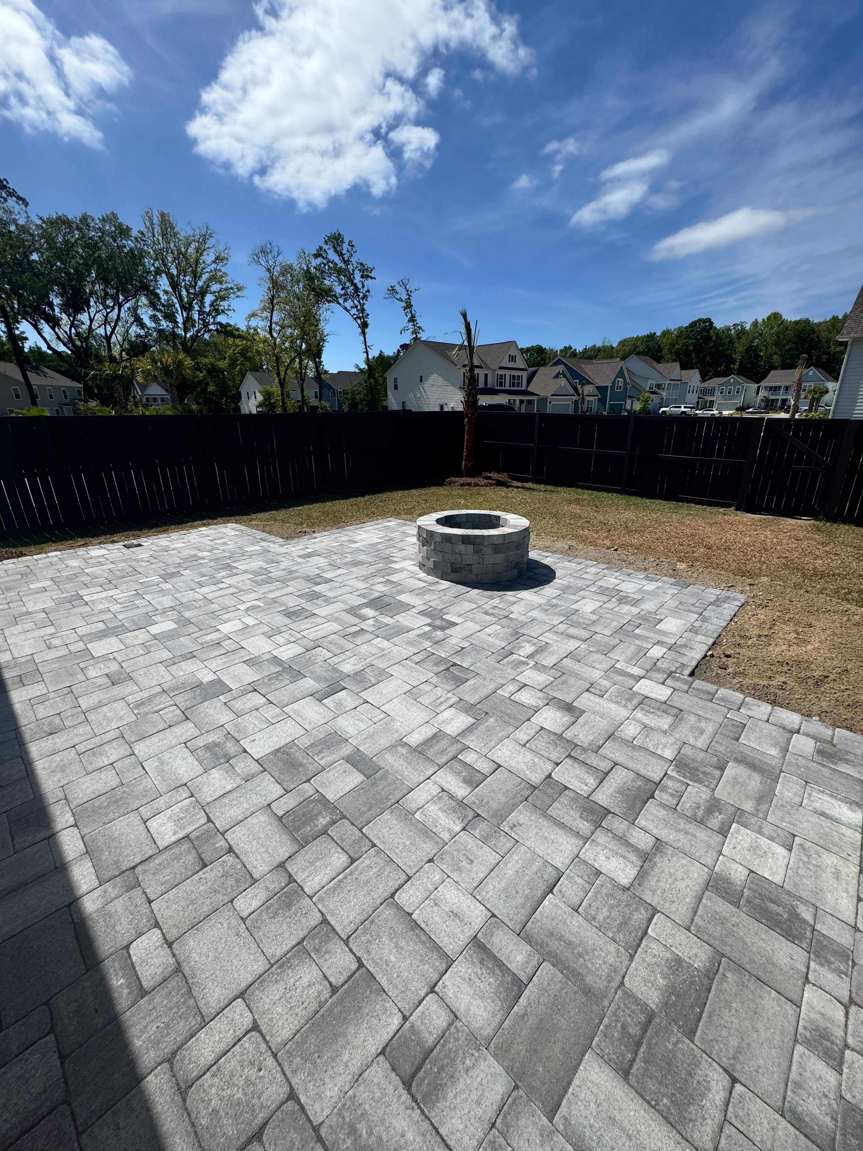 Custom Paver Patio and Stone Fire Pit Installation in Mt Pleasant by Lowcountry Scapes, LLC