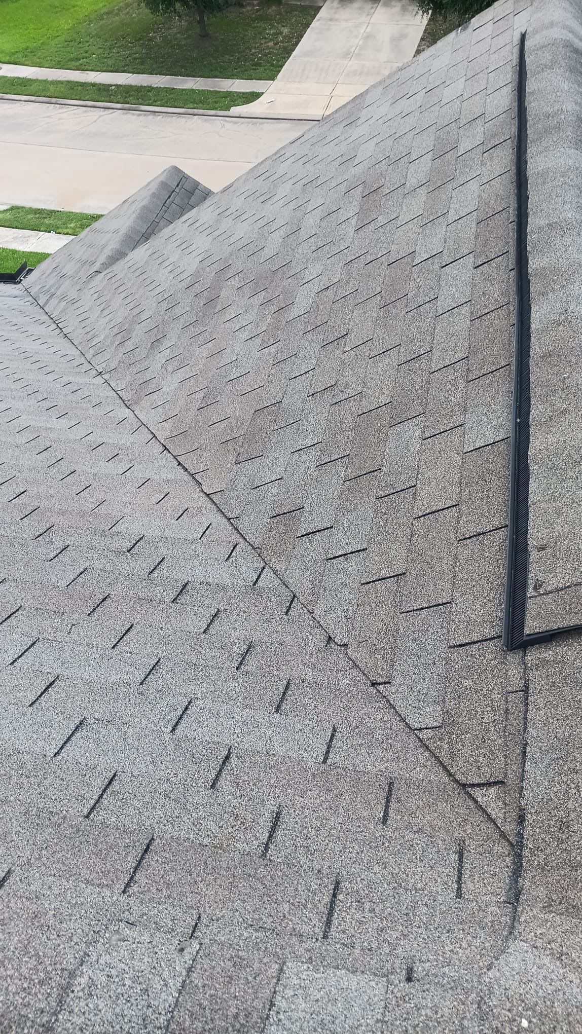 Hail Damage using Owen's Corning Duration (Lifetime) Shingles by Roof Repair Company