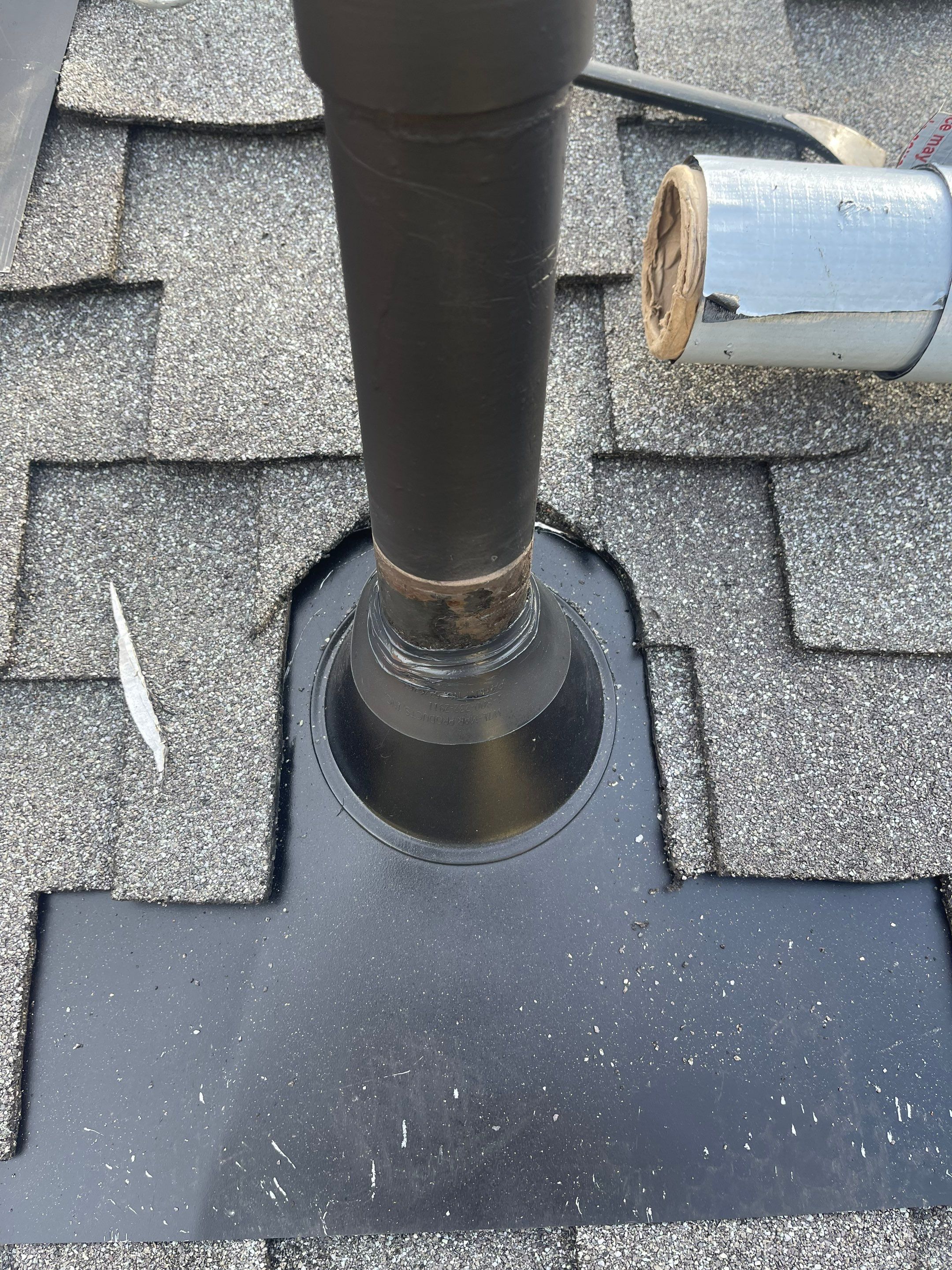 Residential Roofing Installation using Owens Corning Insulation by Byers Enterprises 