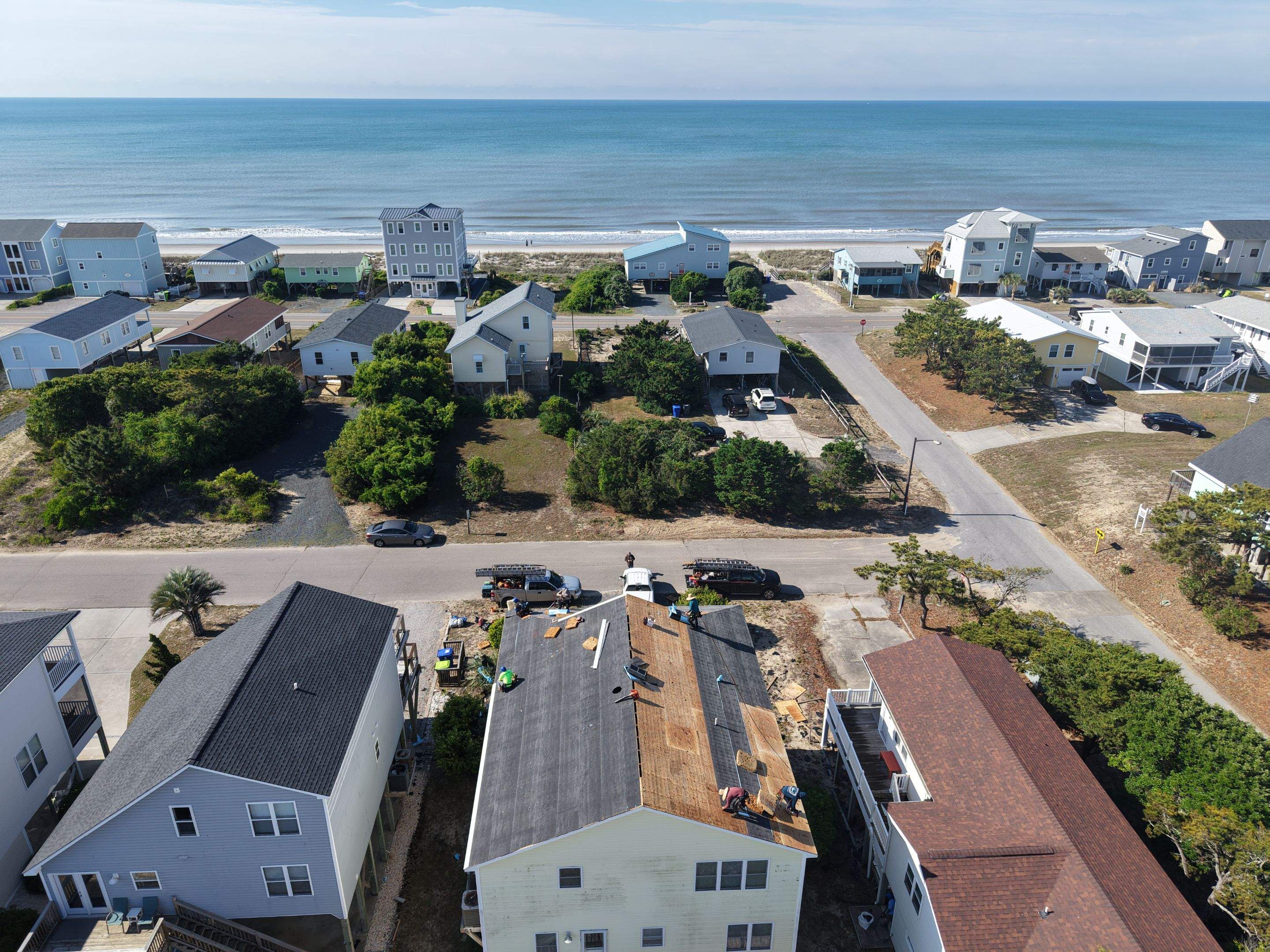 Oak Island Roof Replacement with CertainTeed Landmark PRO Moire Black by RGR Construction and Roofing, LLC