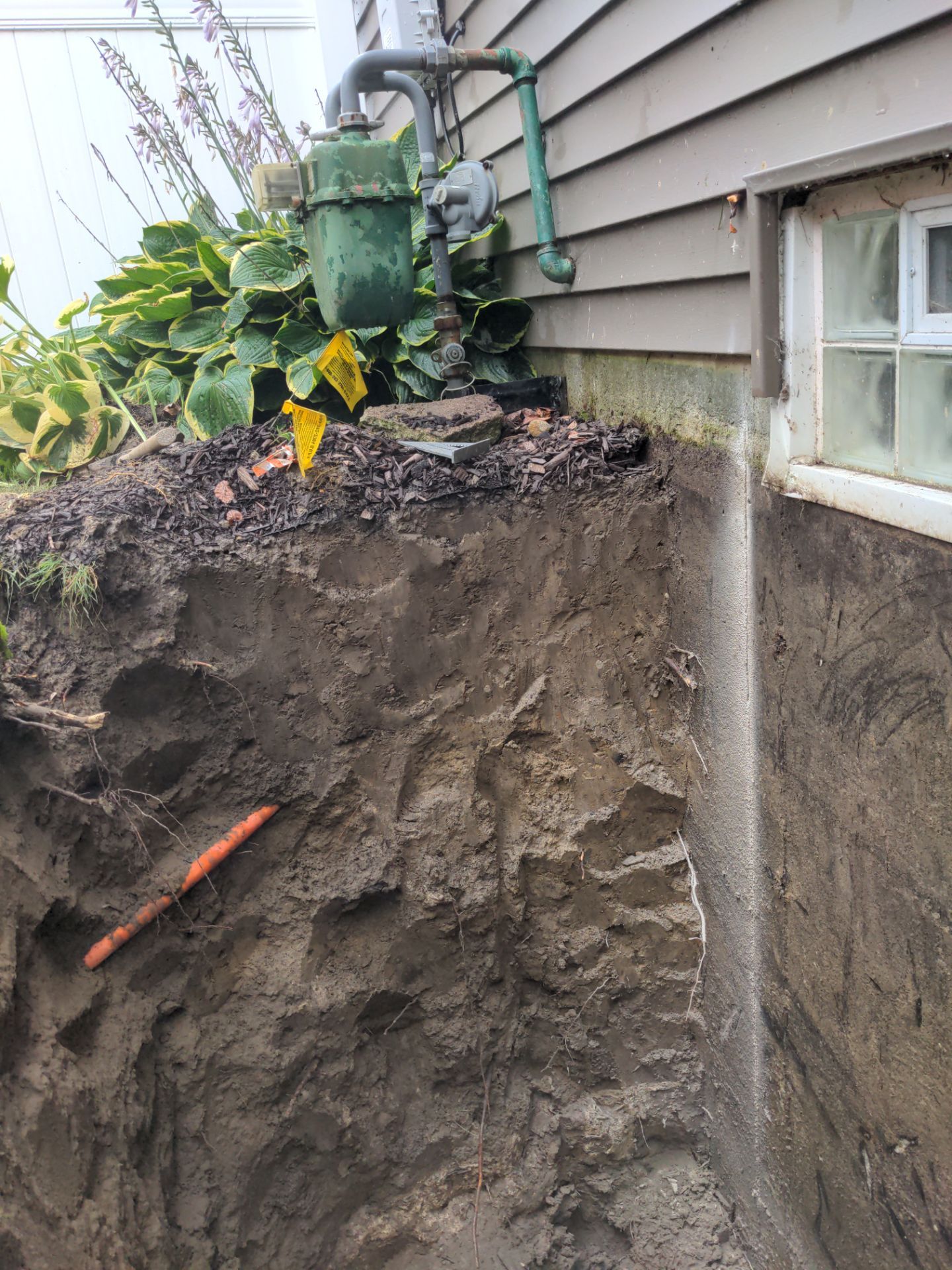Interior Basement Waterproofing System and Egress Window Installation by Toledo Basement Repair 
