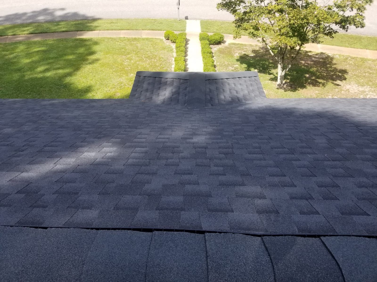 Residential Roofing Installation using Roof Replacement by American Roofing & Construction LLC