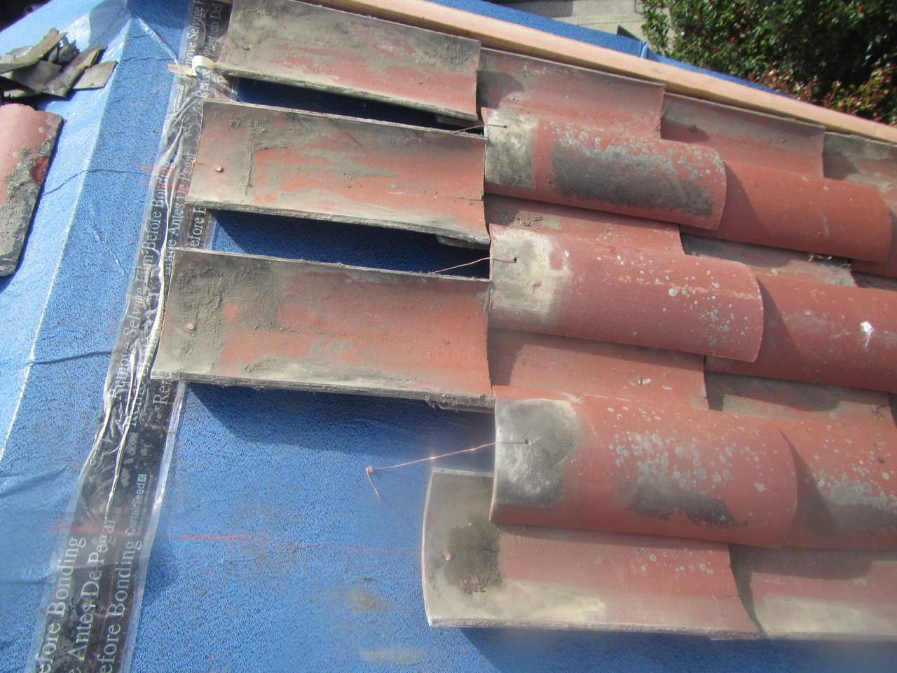 Millbrae Residential Reroof with Terracotta Clay Tiles and Synthetic Underlayment by Eastman Roofing & Waterproofing Inc.