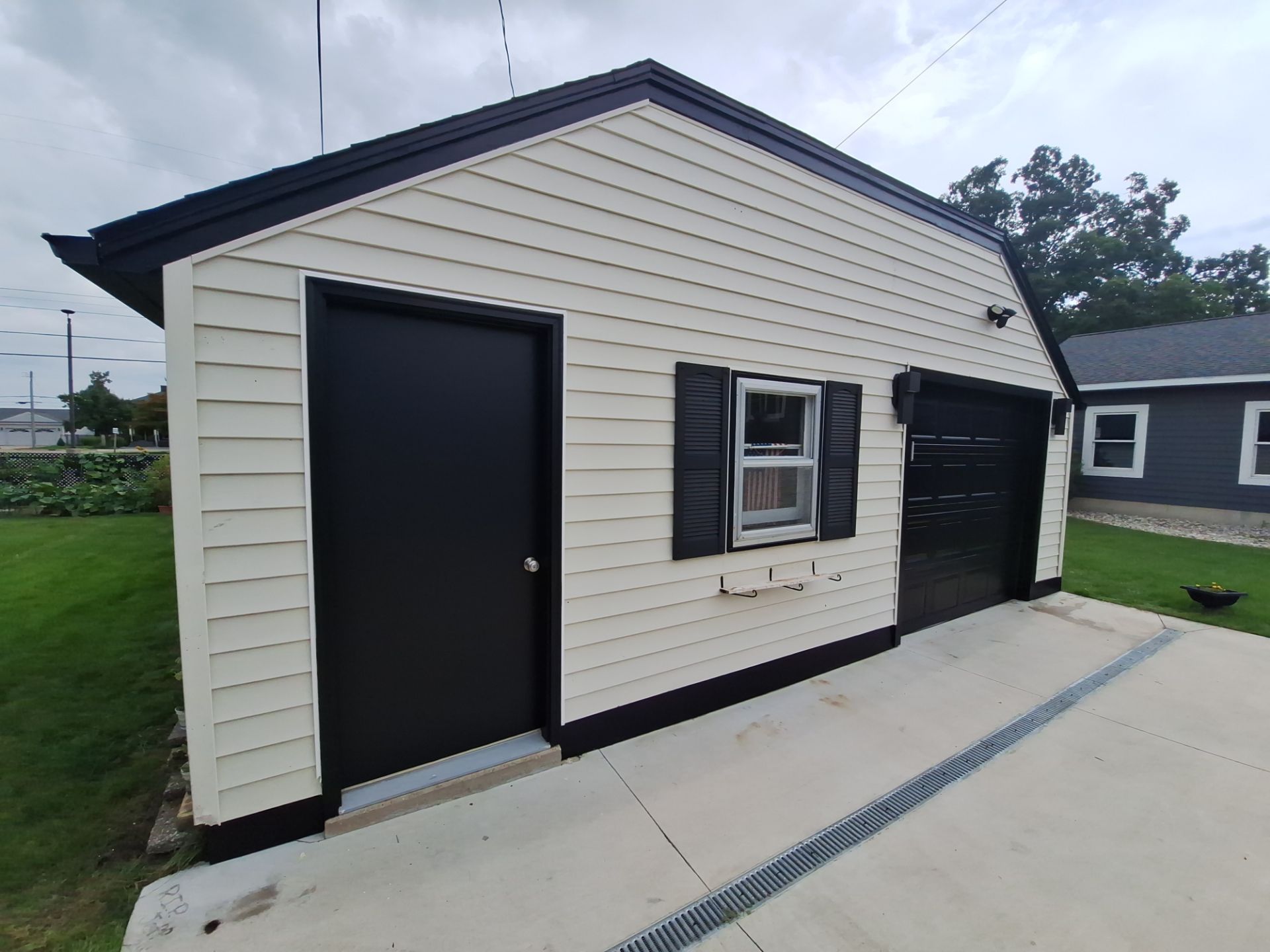 Epoxy Flake Garage Floor & Foundation Refresh – Seamless, Durable, and Clean Finish by Gordon Painting