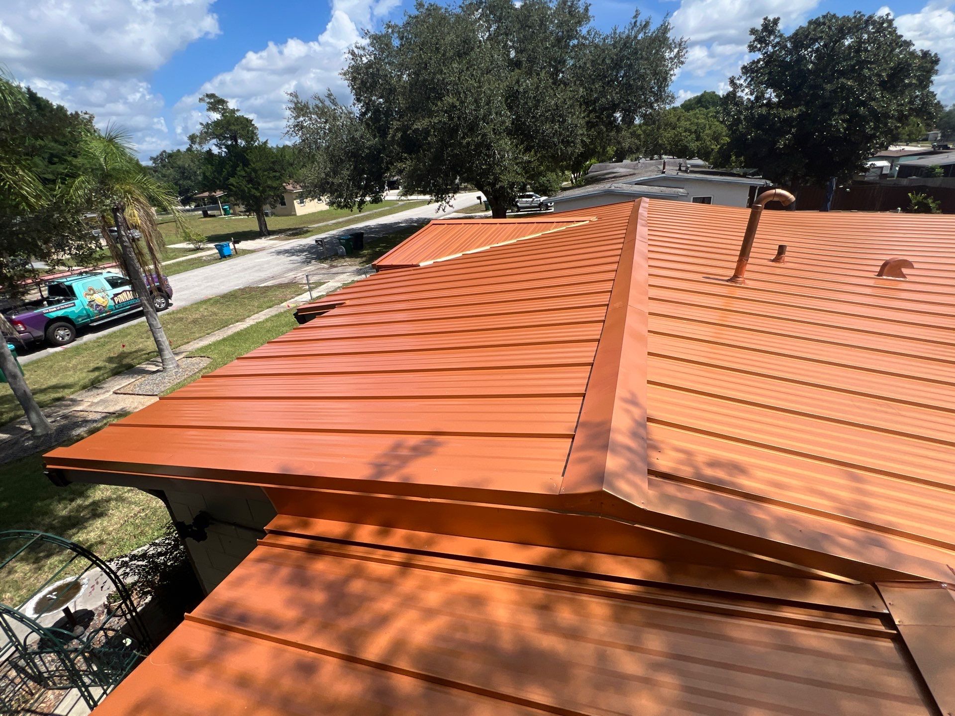 Standing Seam Metallic Copper Metal Roof Replacement in Deltona by Pinnacle Roofing Group