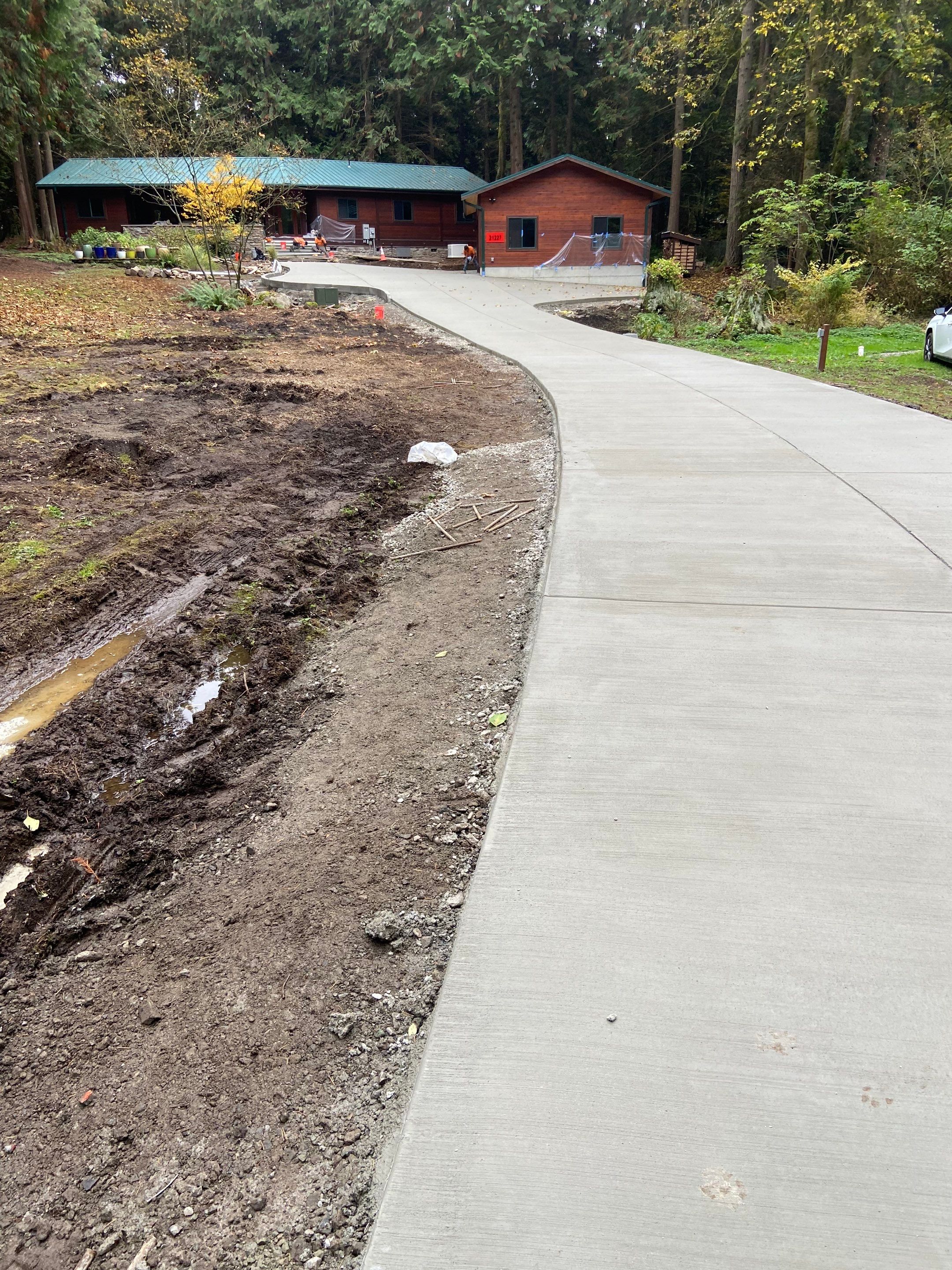 Pia | Custom Concrete Driveway, Walkway & Floating Steps by Jireh Asphalt & Concrete Inc 