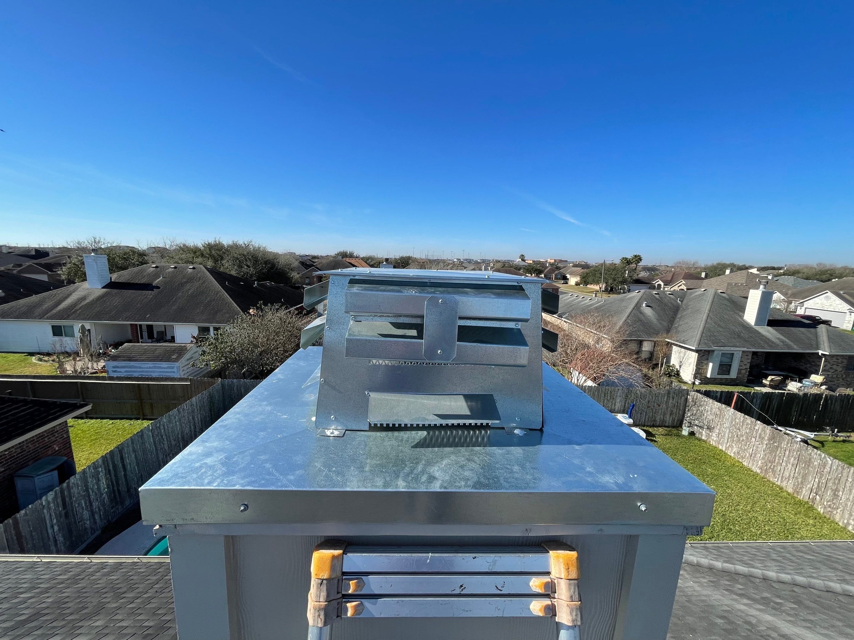 Residential Roofing Repair Replacing Chimney Cap by Lighthouse Roofing
