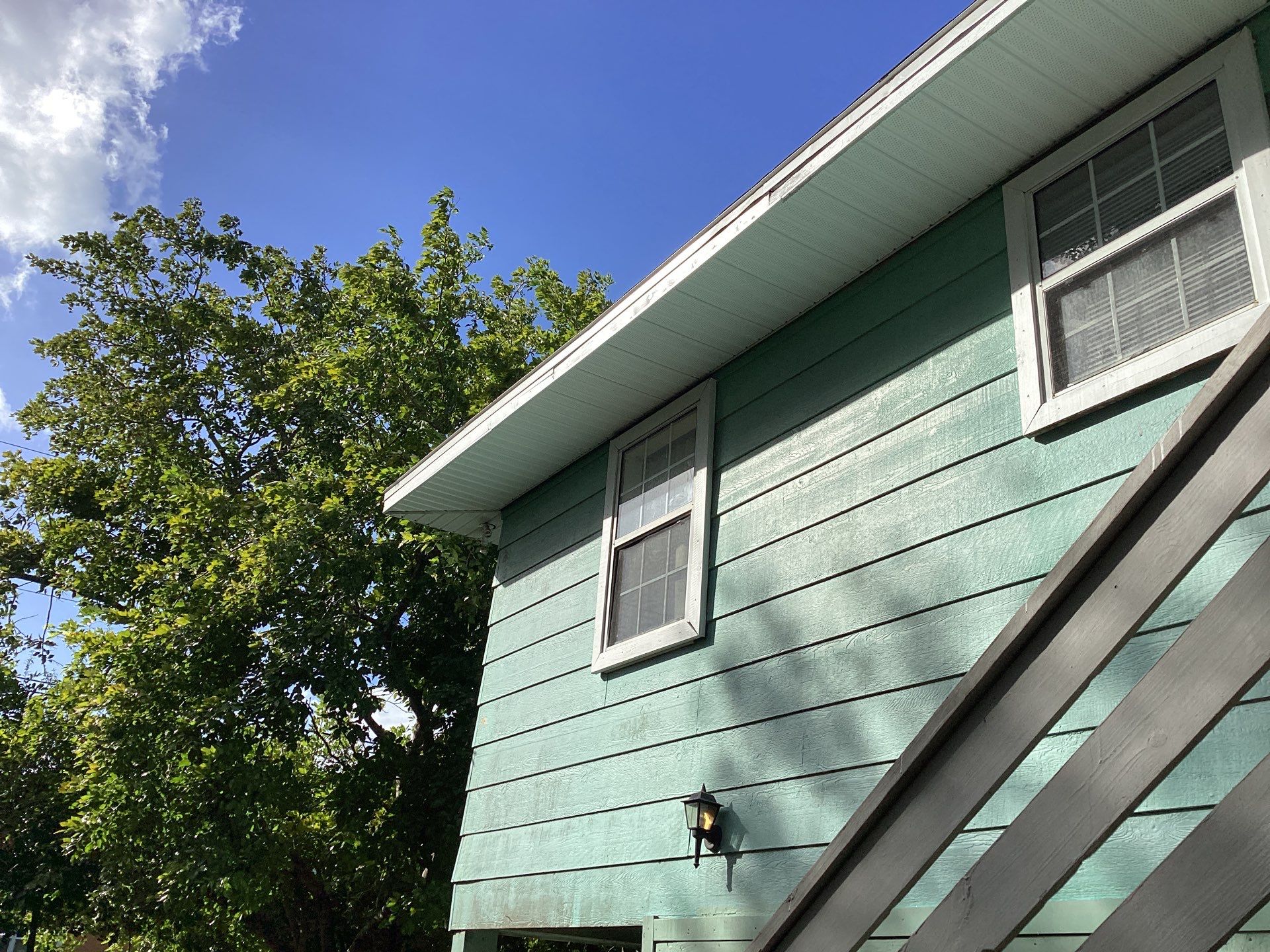 Soffit and Fascia Installation using White Soffit in Lehigh Acres, FL by Gutter Professors
