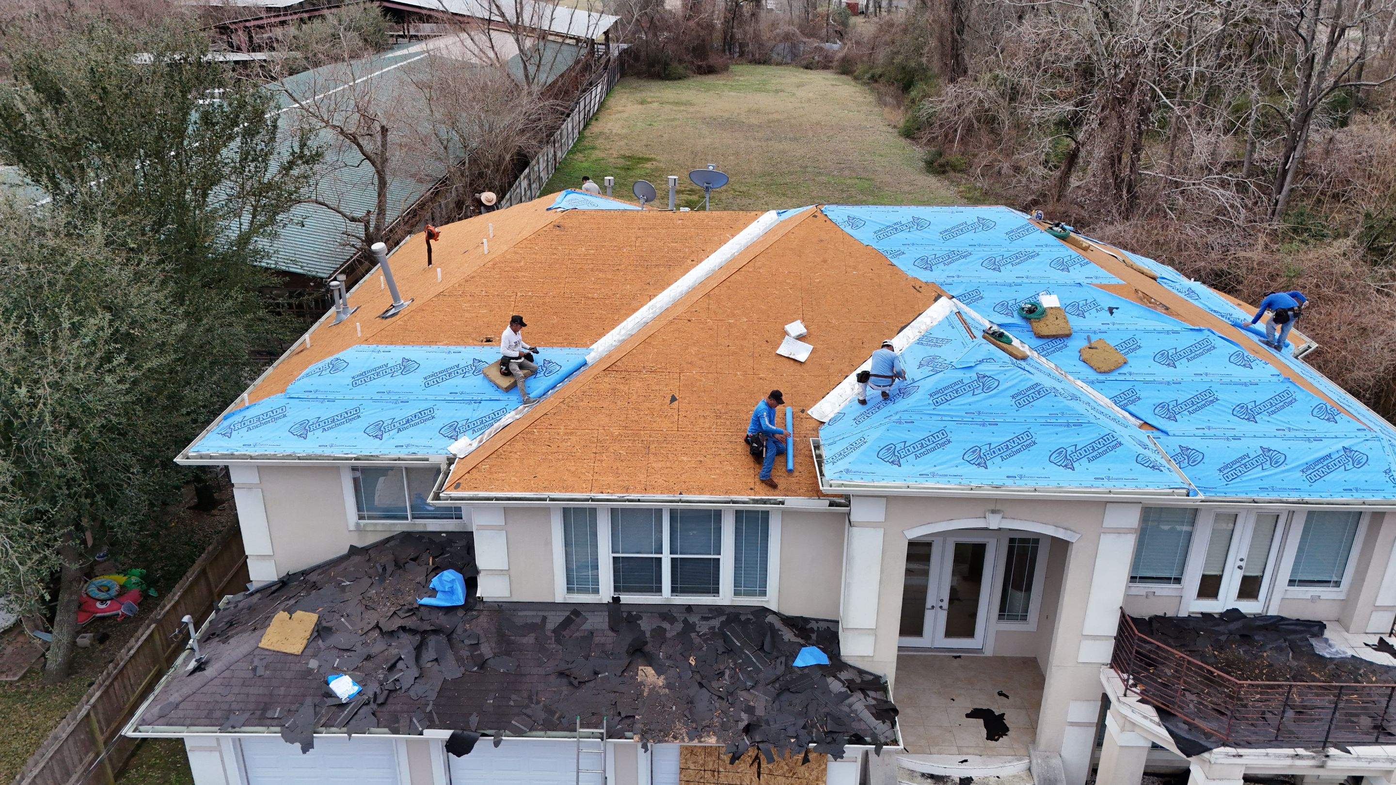 Storm-Damaged Roof Rebuilt, Deck Repairs Included — Houston, TX by PL Roofing & SB Roofing, LLC.