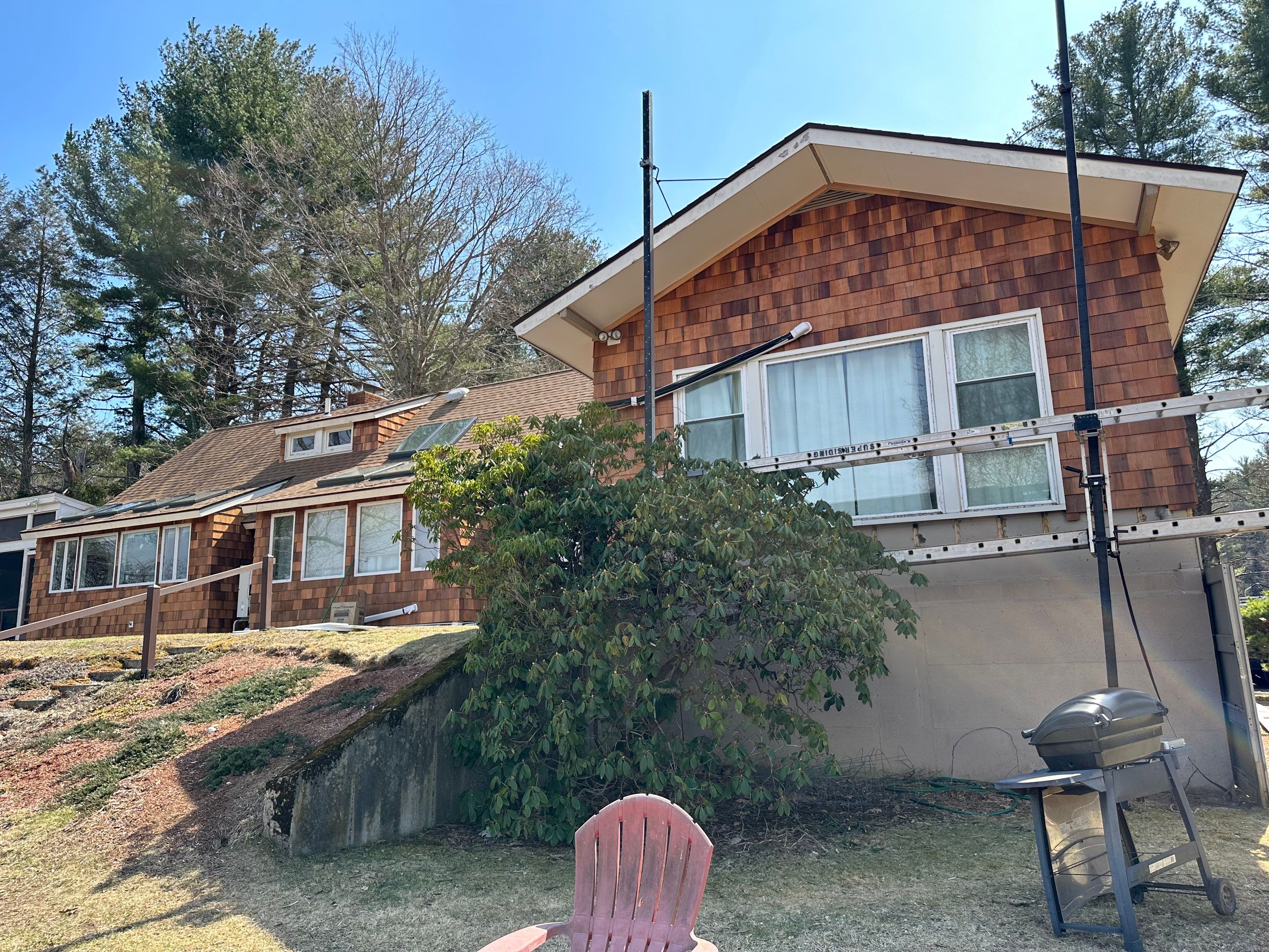 Siding Installation using Perfection Red Western Cedar Shingles  by Loyalty Exterior Solutions 