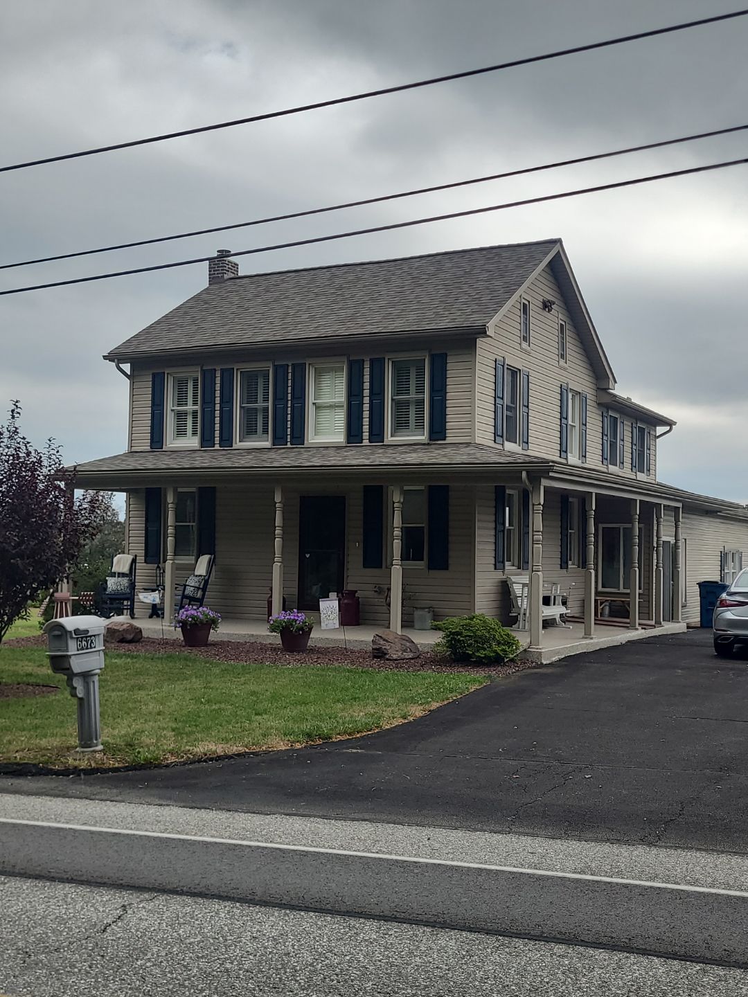 Roof Replacement and Chimney Restoration with Shutter Upgrade in East Berlin, Pennsylvania by Bealing Roofing & Exteriors