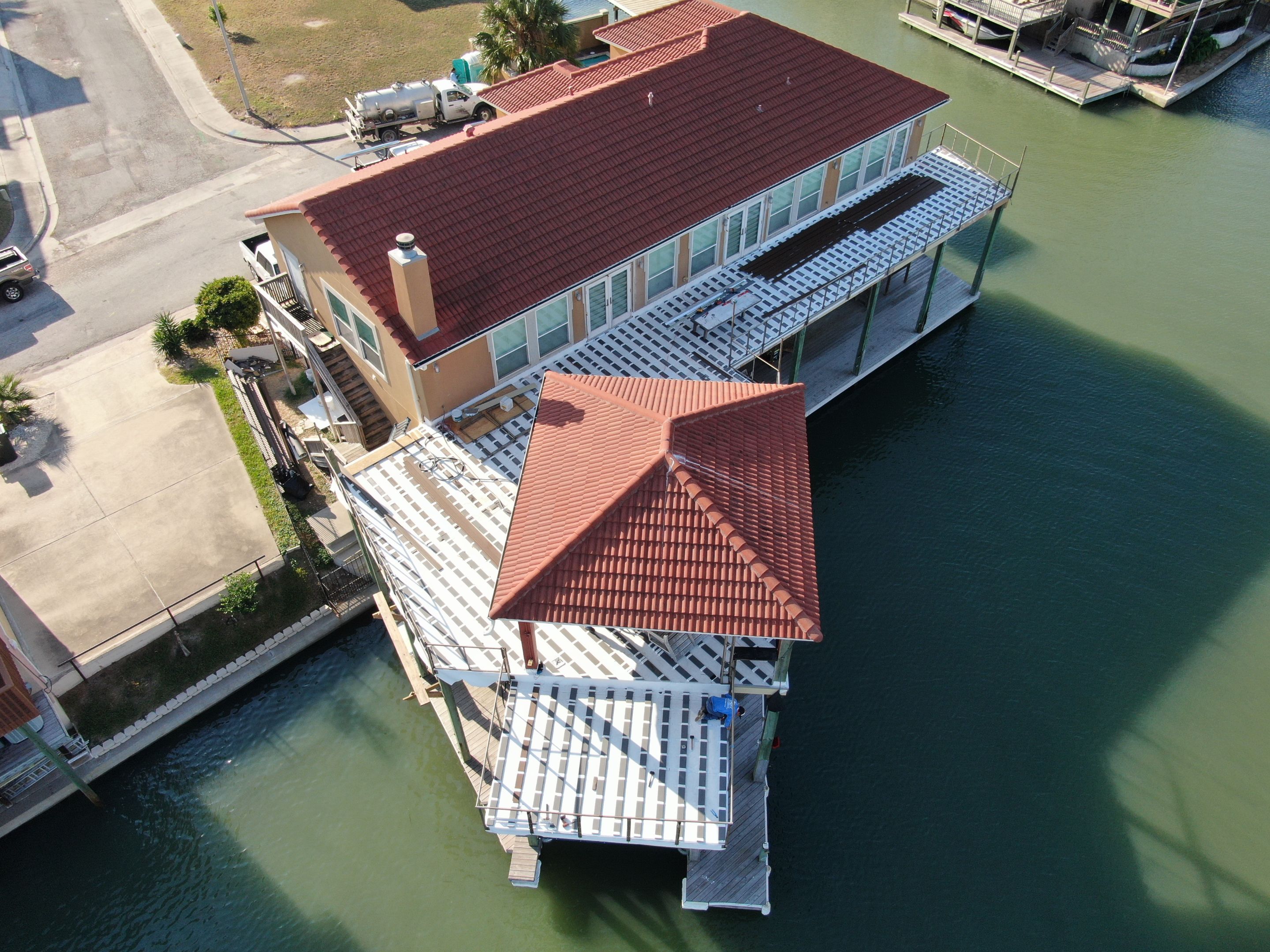 Walk Out Patio Cover by Bayfront Roofing and Construction