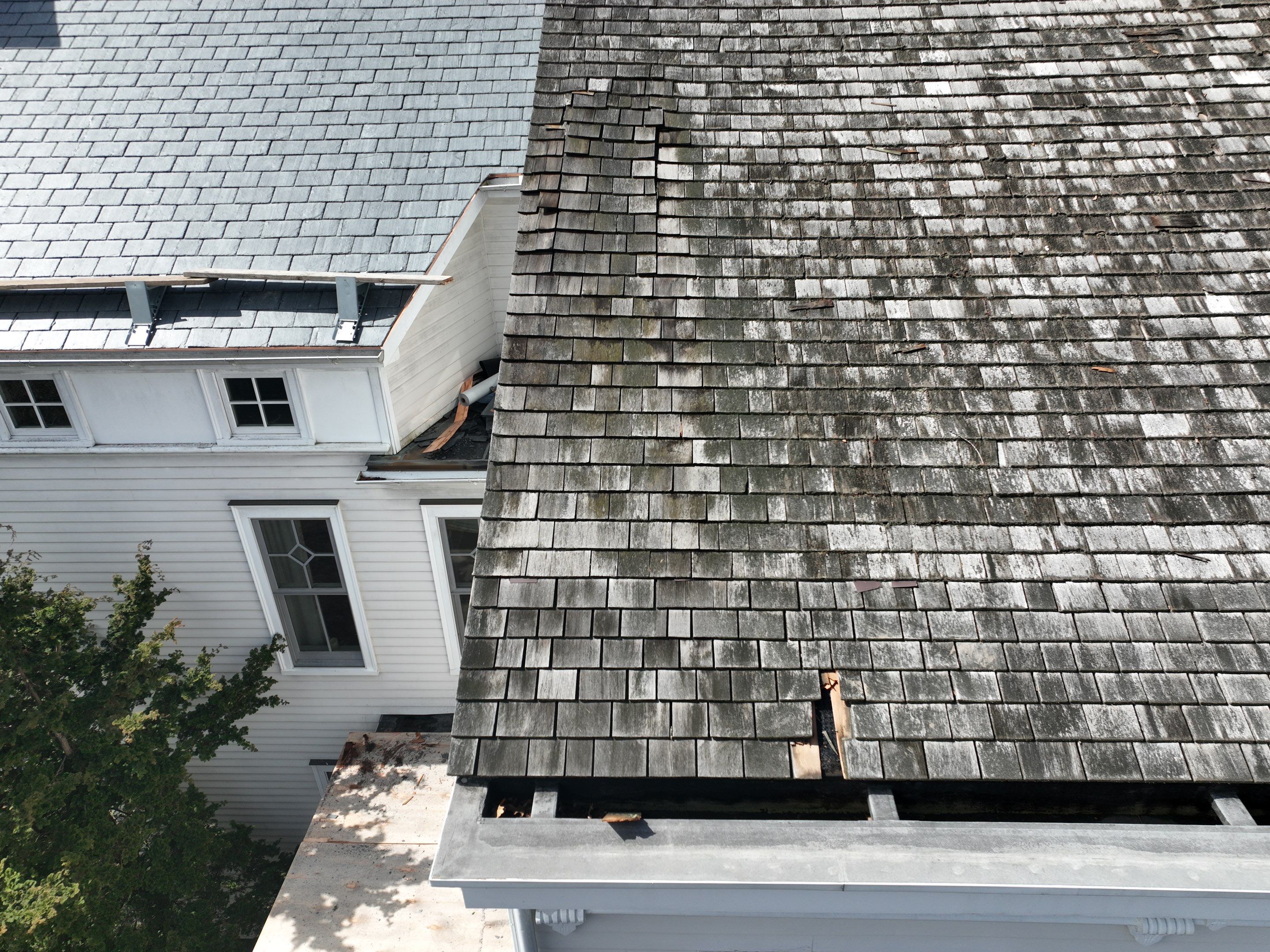 Residential Roofing Installation using Vermont Slate by A Plus Exterior