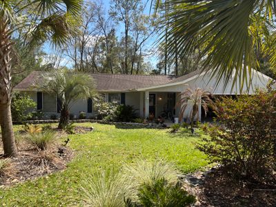 Custom Sliding Glass Door Installation with Integrated Pet Doors in Gainesville