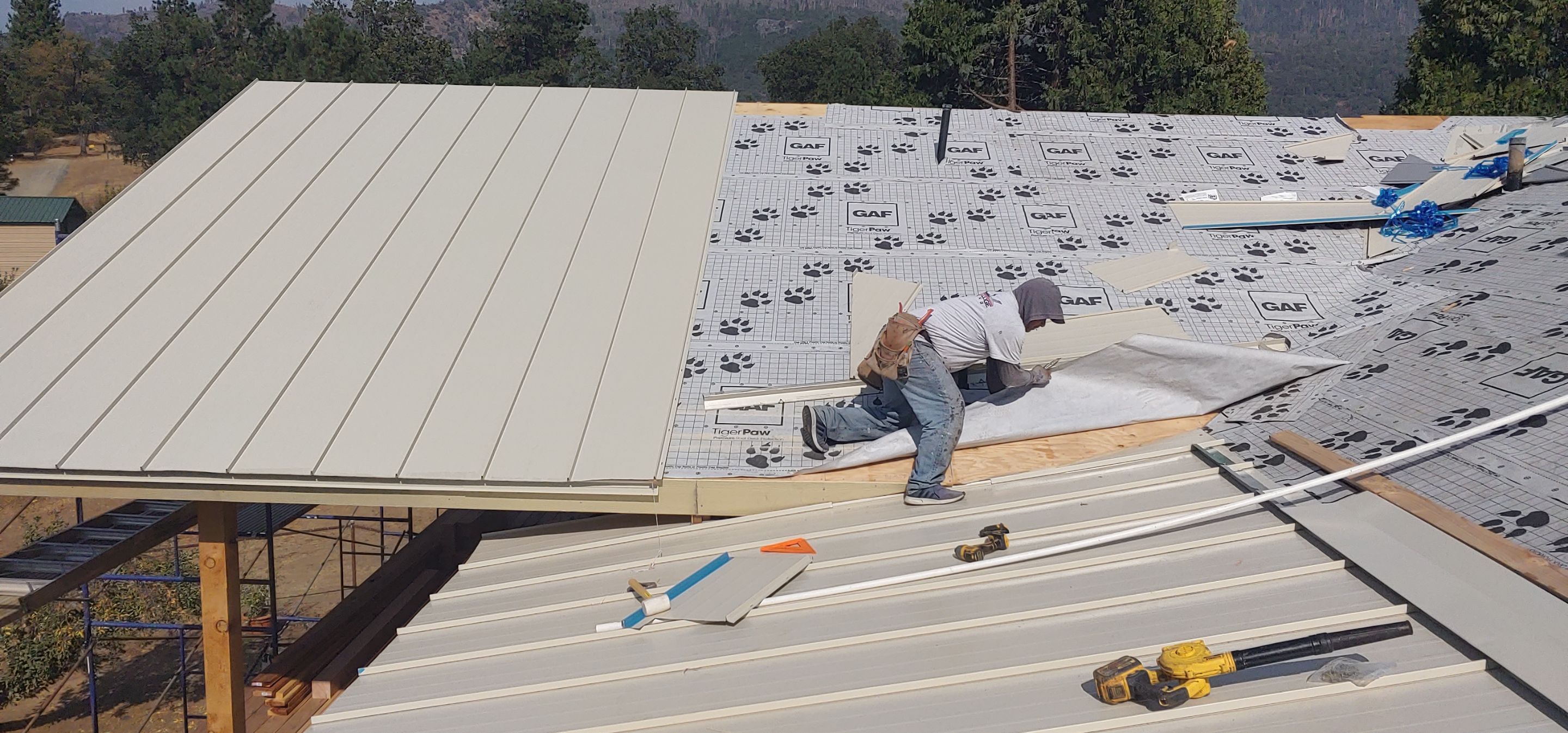 Residential Roofing Installation using Standing seam metal roofing system by Straight Edge Roofing Inc