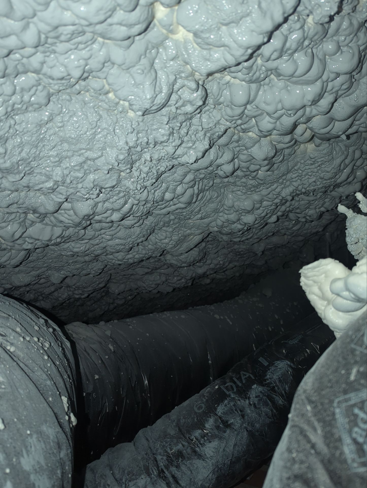 Attic Retrofit using open cell spray foam by NYS Foam & Energy