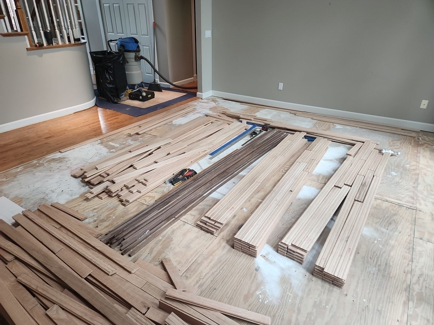 Ann Arbor Elegance: Red Oak and Walnut Living Room Masterpiece by Ann Arbor Hardwoods
