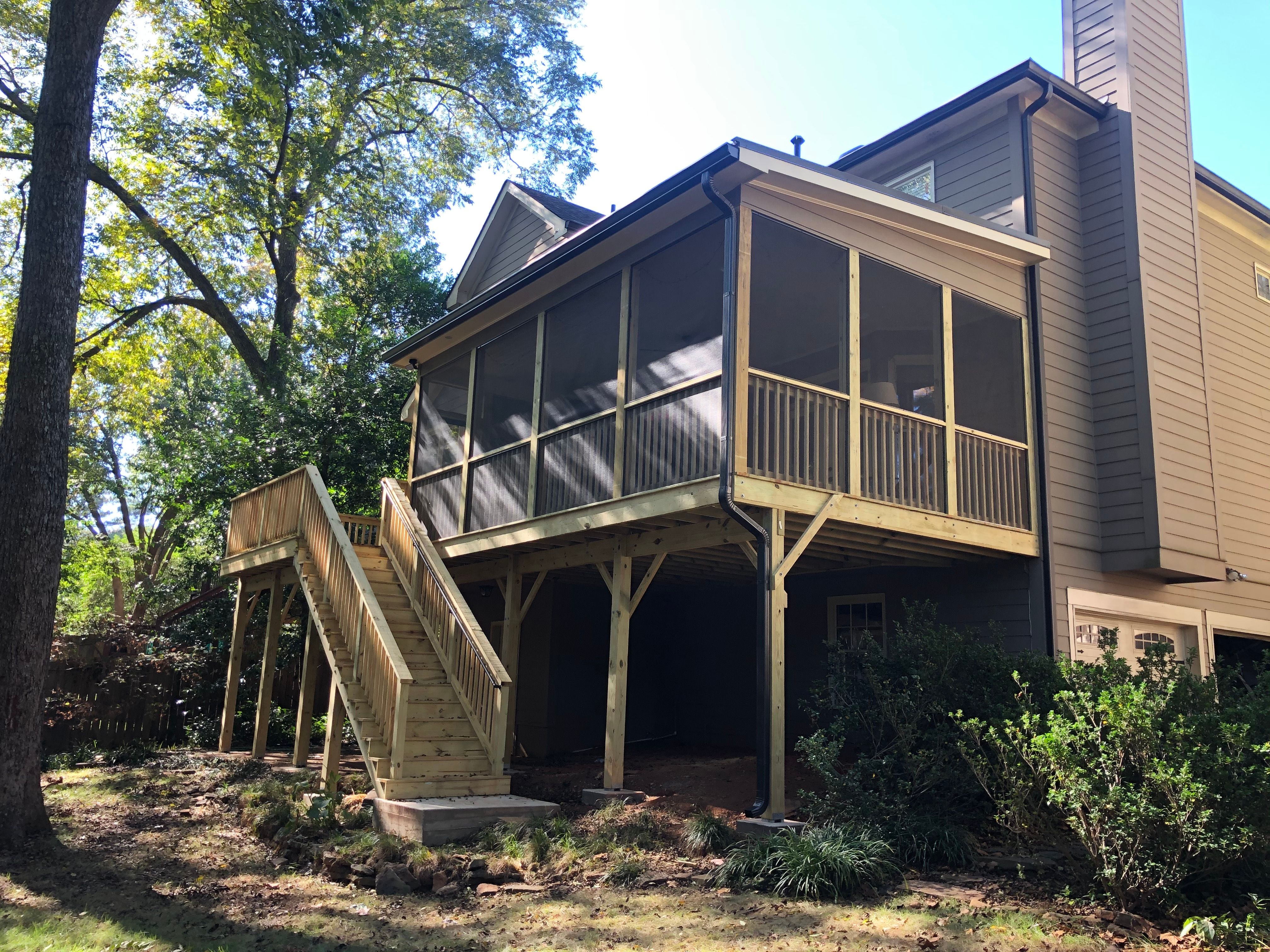 Elevated Screened-In Porch and Custom Wood Deck in Decatur by Swift Home Renovations 