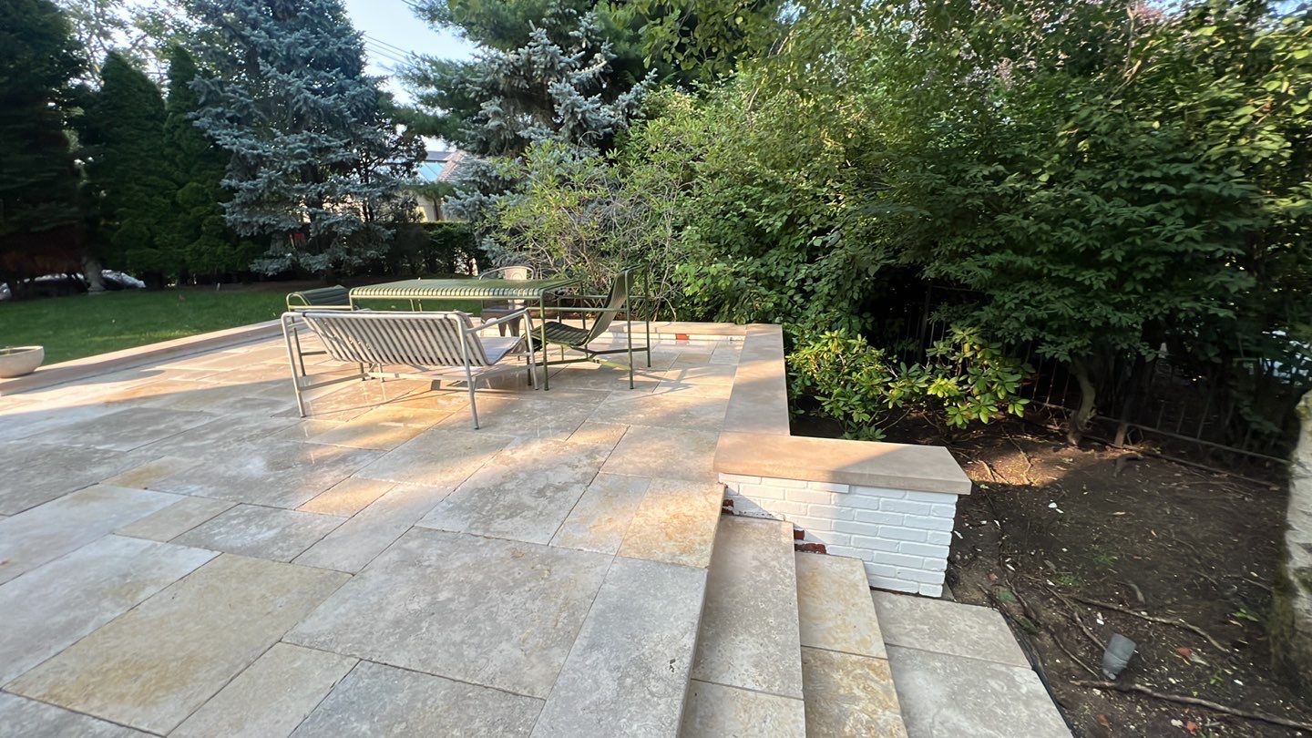 marble patio cleaning and sanding using Polysweep polymeric sand by Northern Power Washing LLC.