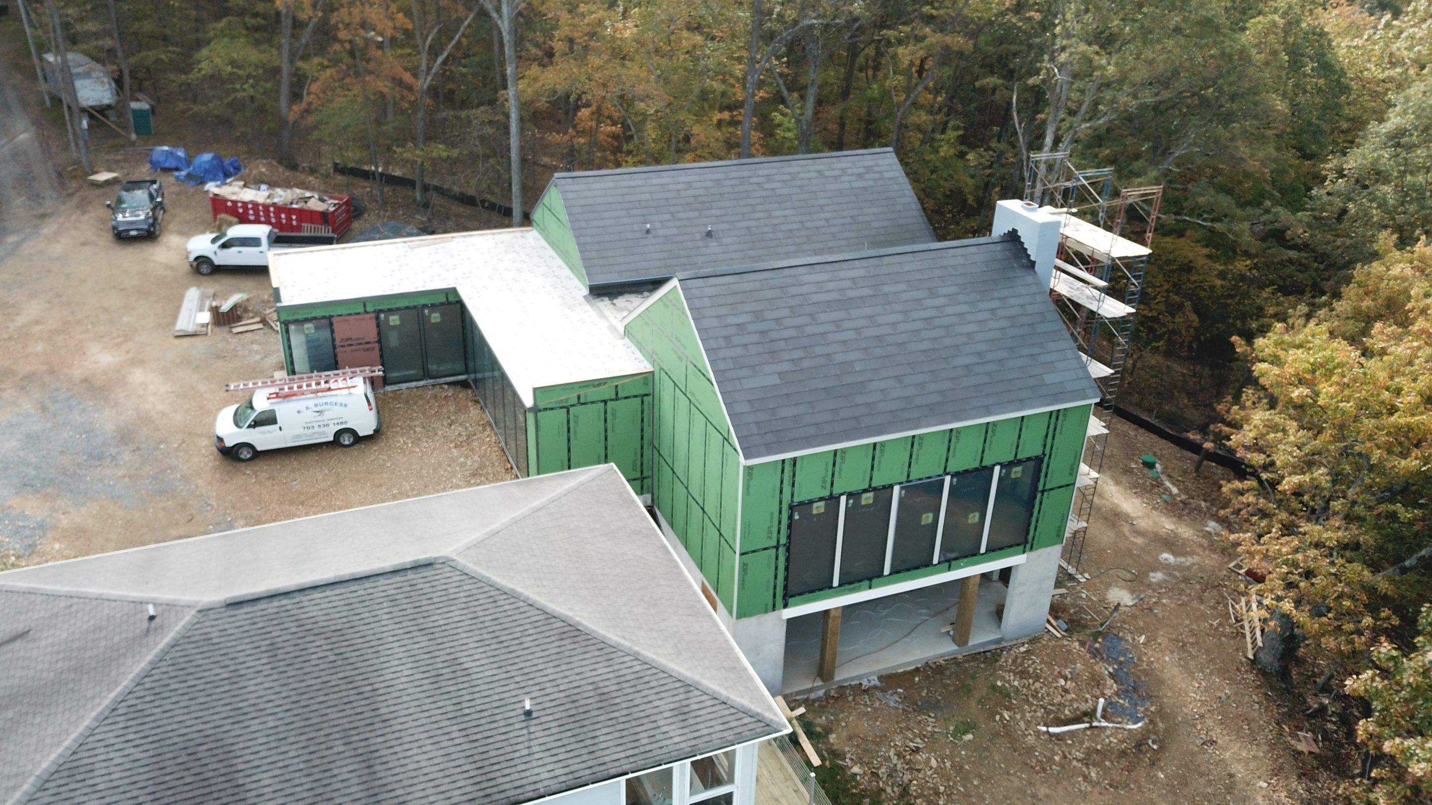 Roof Installation using Tesla Solar Roof V3 by American Home Contractors