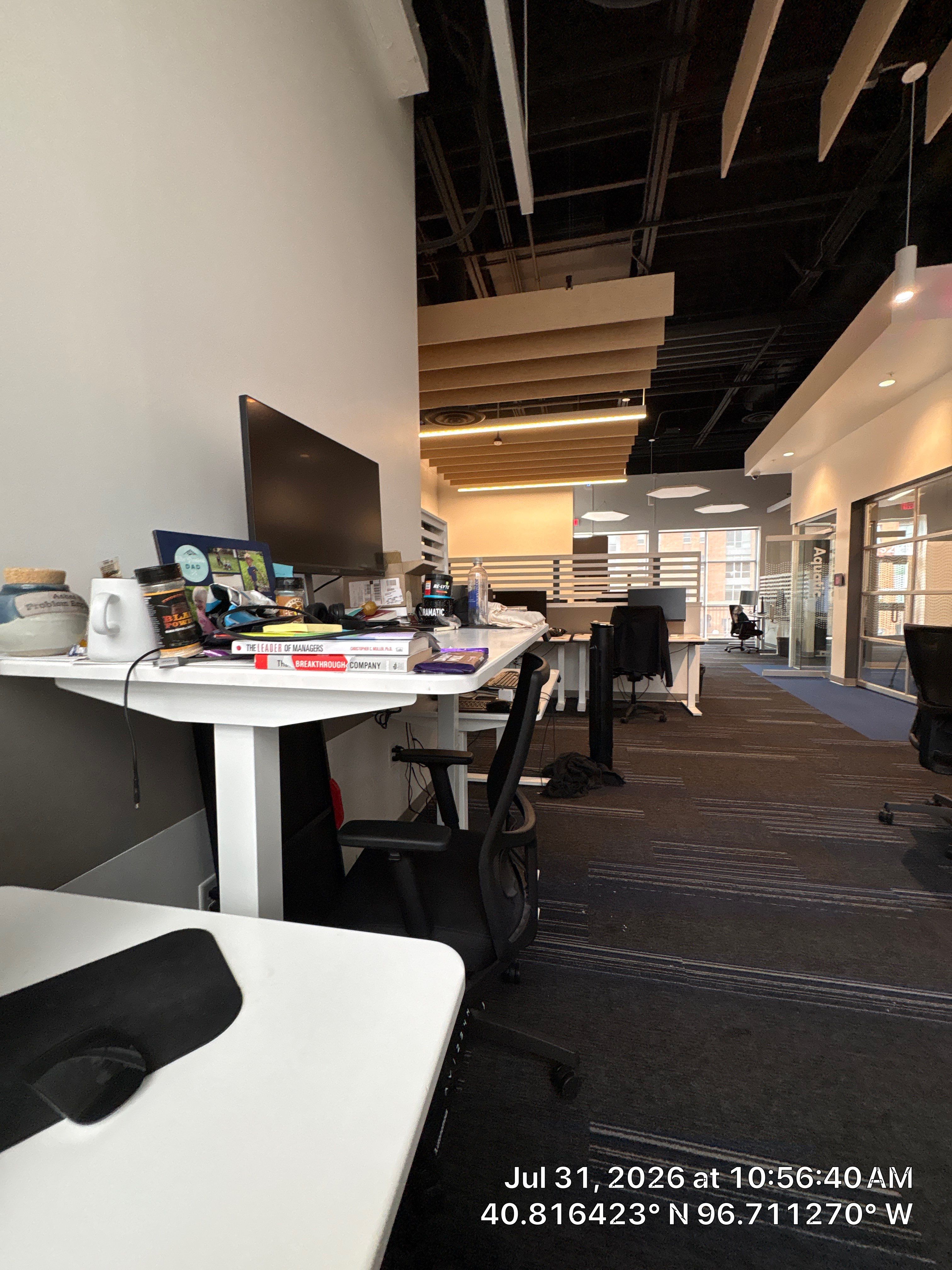 Modern Open-Plan Office Remodel with Acoustic Ceiling Baffles by CompanyCam Sales Demo