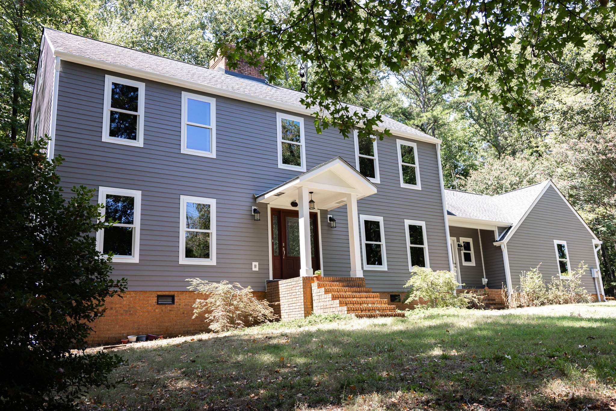 Aged Pewter Hardie + Windows by Freedom Exteriors