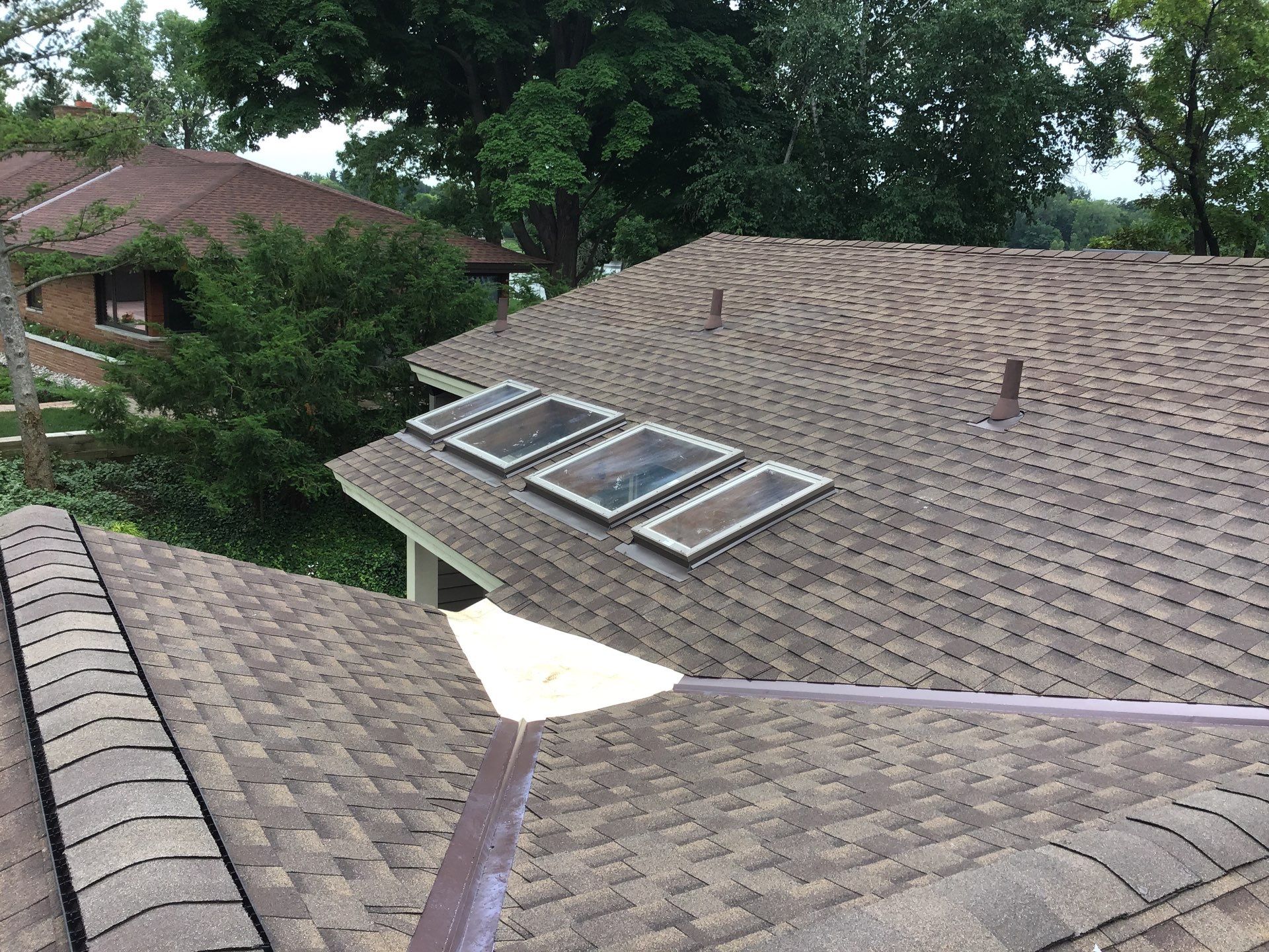 Velux Skylights, GAF Roofing, Front Porch Overhang by Northwest Construction 