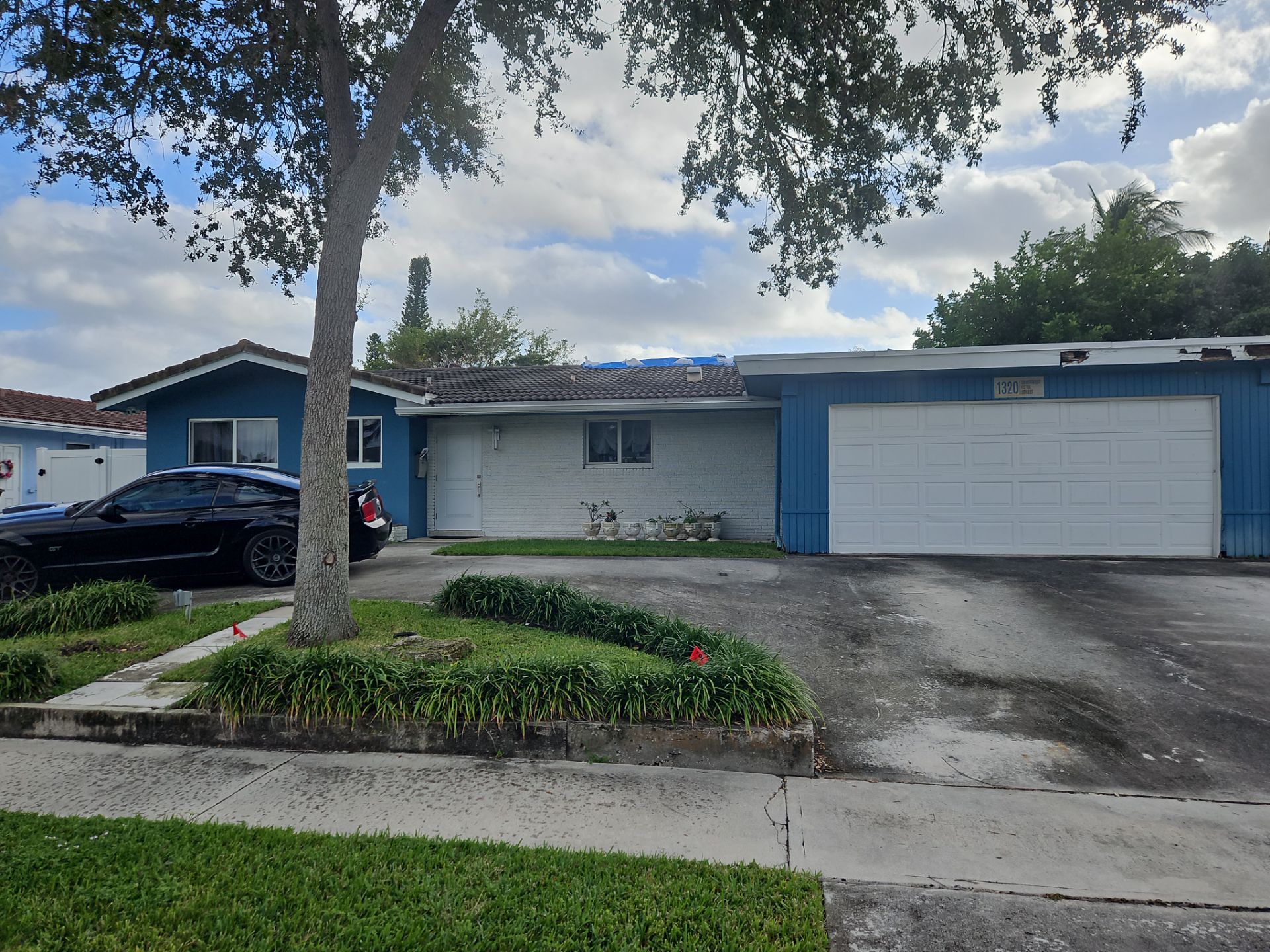 Residential Roofing Installation using 1" Nail strip metal roof by BLUES BROTHERS ROOFING