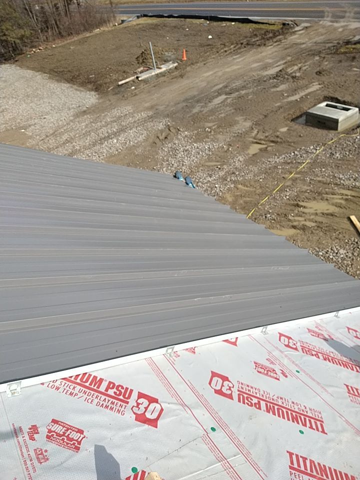Commercial Roofing Installation using Metal roof  by Absolute Roofing and Construction