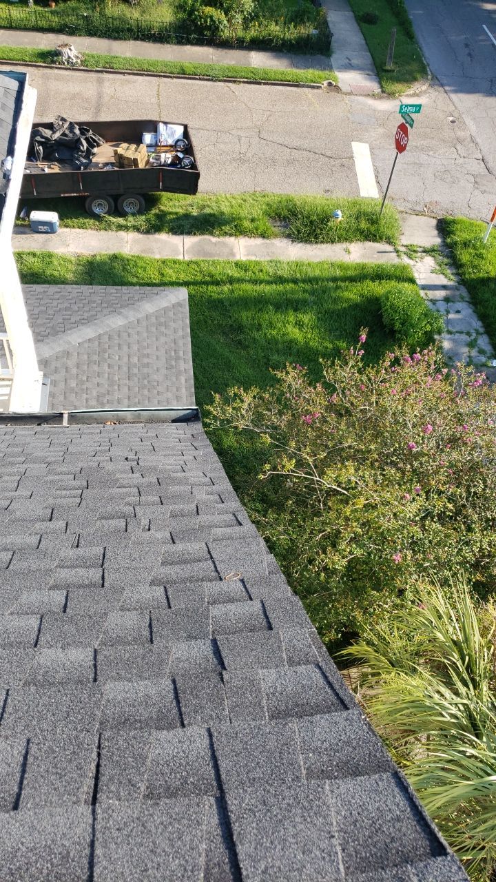 Residential Roofing Installation using Roof Replacement by American Roofing & Construction LLC