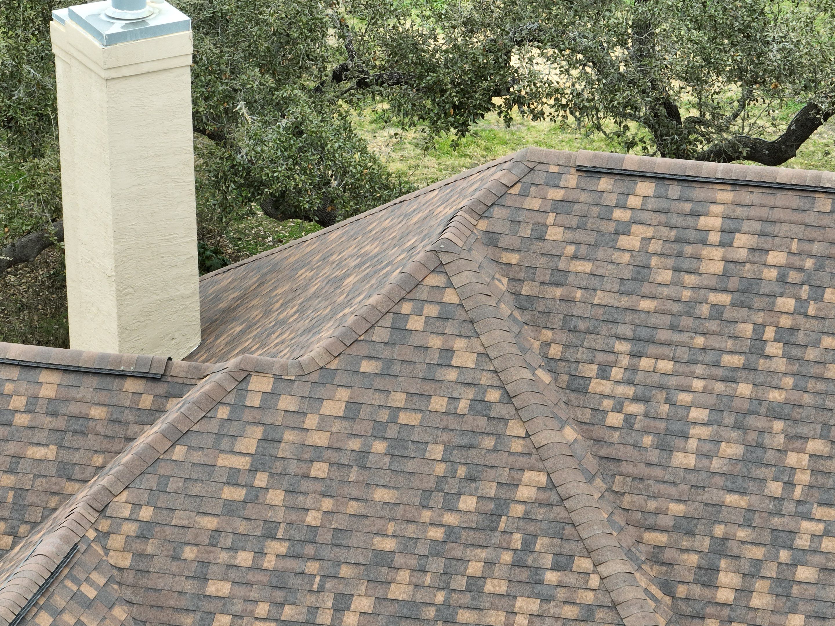 Residential Roof Replacement using 30 Year Laminate Shingles with High Profile Ridge by Premier Roofing and Contracting