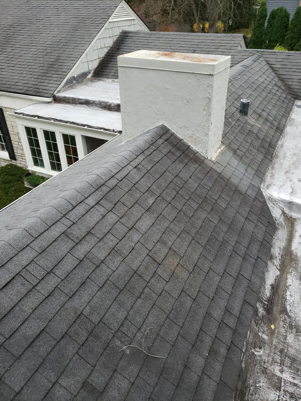 Asphalt Roof Replacement by Custom Installations