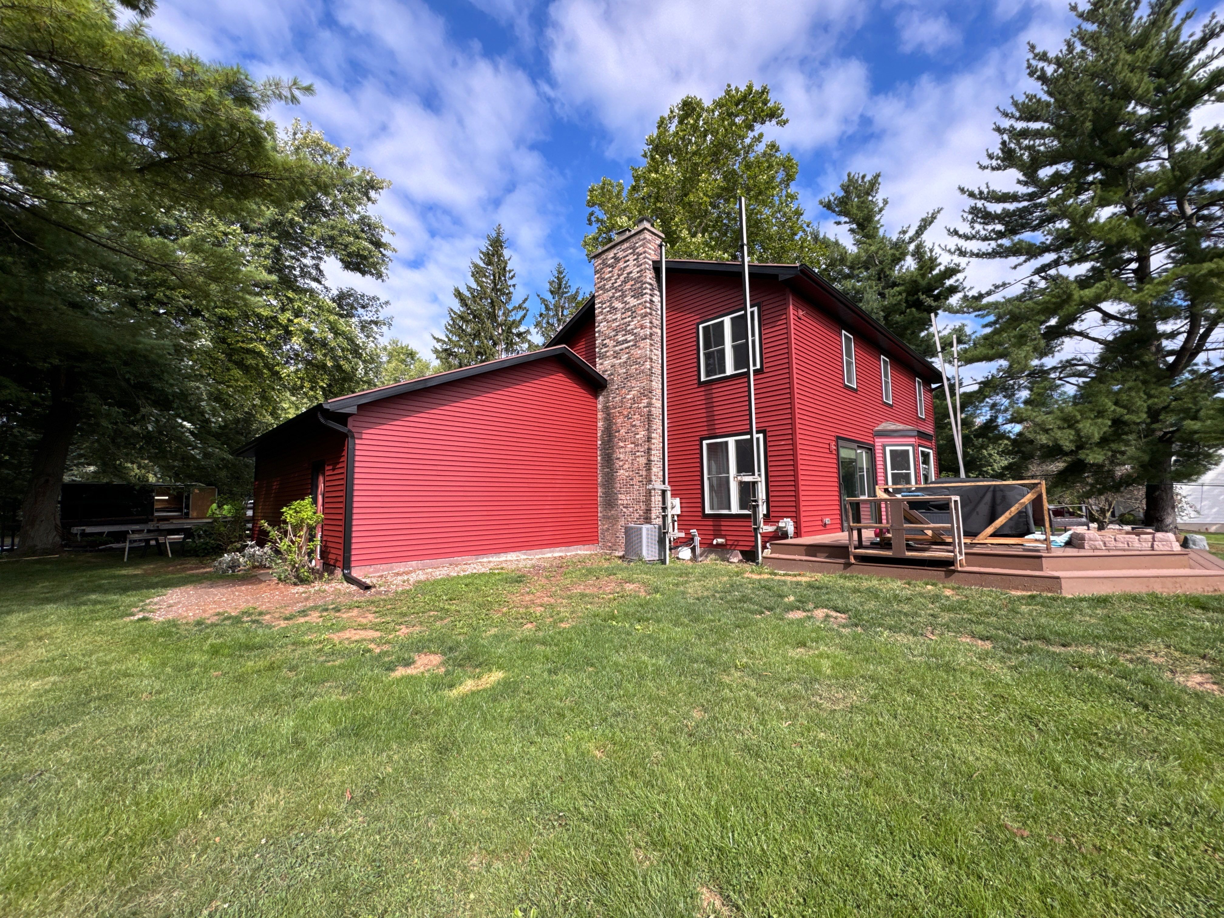 Vinyl Window & Siding Project in rand Ledge by 42 North Construction, LLC.