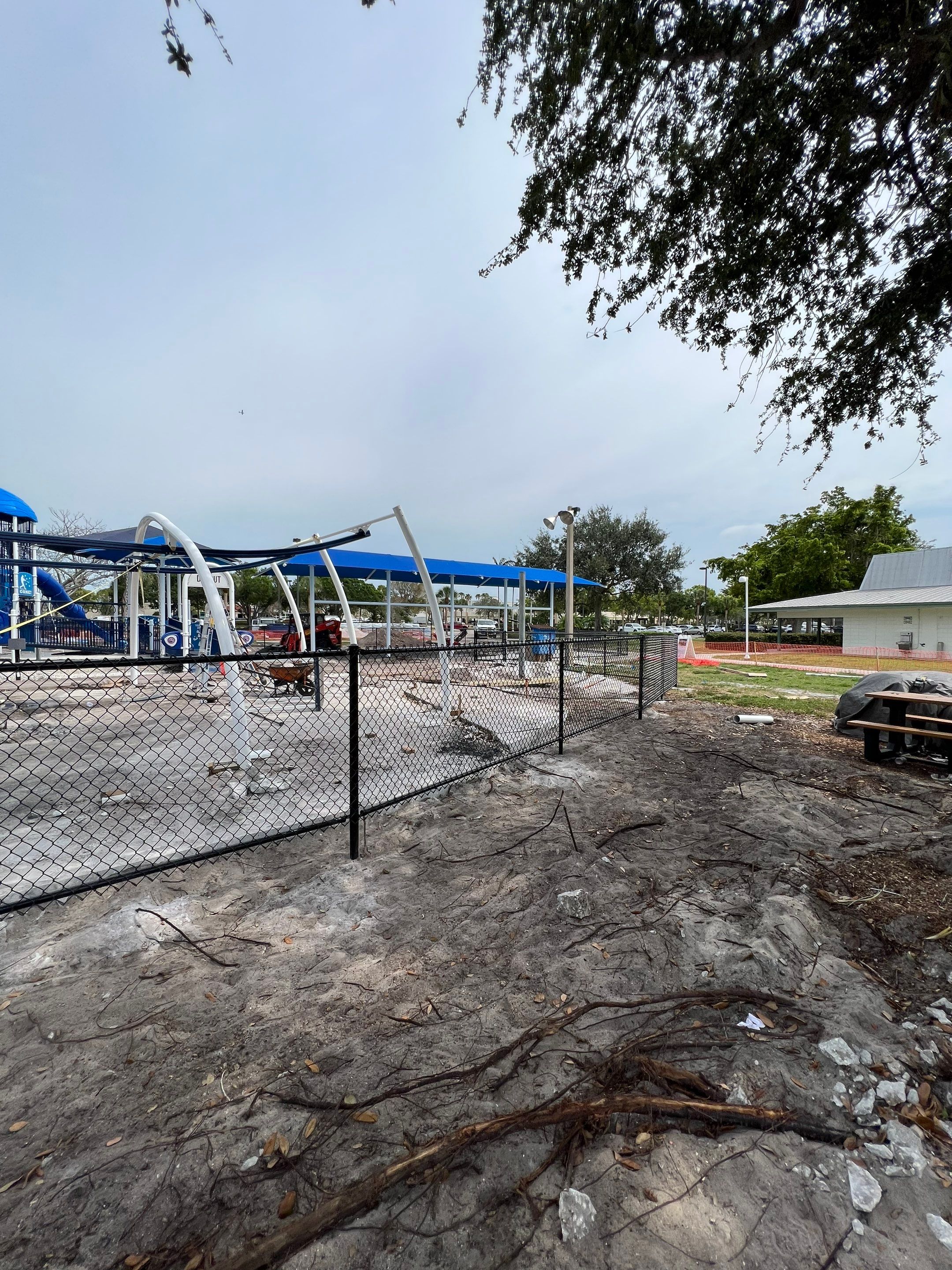 Vinyl Coated Chain-link fence for the City of Naples around Fleischmann Park Playground.  by Asap fence and gates, LLC