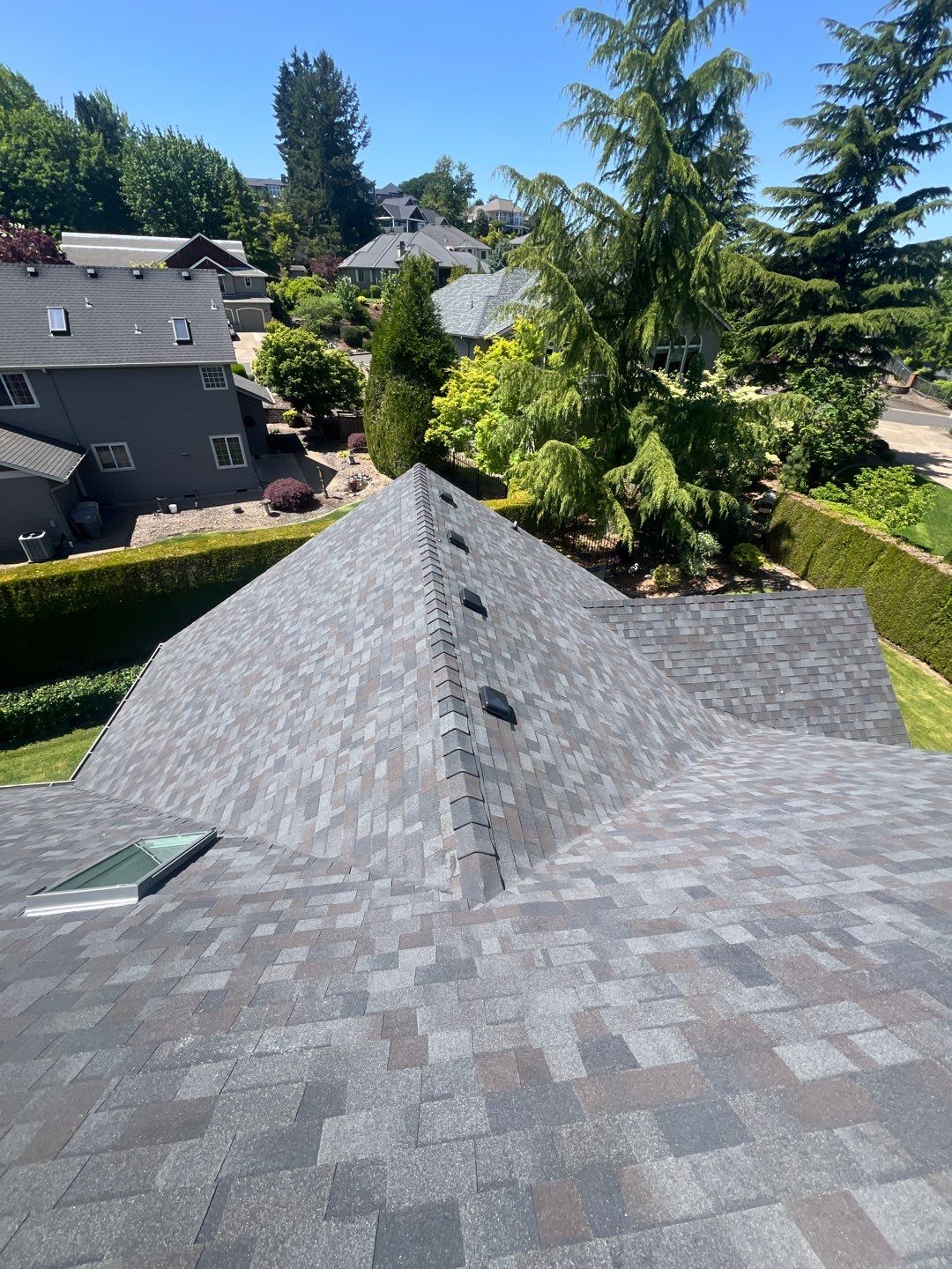 Residential Roofing Installation using Malarkey Vista (Color: Black Oak) by Orezona Building & Roofing Company, Inc.