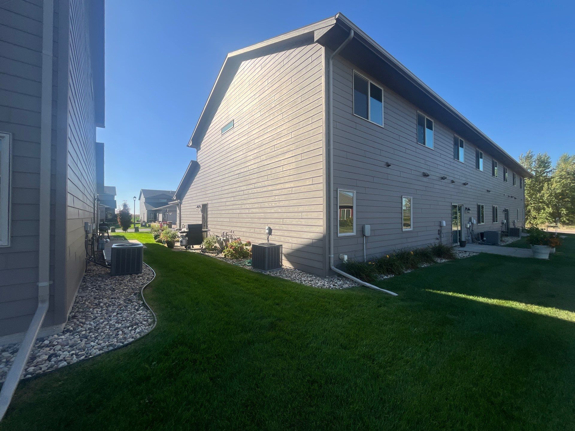 Multi-Family Exterior Painting and Trim Refresh in Sioux Falls by Select Painting, Coatings & Garage Cabinets